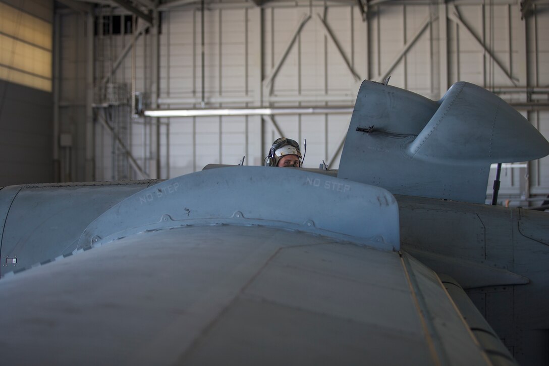 U.S. Marines Corps Cpl Kyle Sewer, an MV-22 tiltrotor mechanic with Marine Operational Test and Evaluation Squadron (VMX) 1, conducts routine maintenance on a MV-22 Osprey on Marine Corps Air Station (MCAS) Yuma, June 18, 2020.