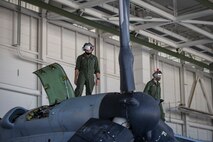 U.S. Marines Corps Cpl Kyle Sewer, left, and Cpl Reid Ellis Jr, MV-22 tiltrotor mechanics with Marine Operational Test and Evaluation Squadron (VMX) 1, conduct routine maintenance on a MV-22 Osprey on Marine Corps Air Station (MCAS) Yuma, June 18, 2020. VMX-1 is an operational test squadron that tests multiple aircraft, allowing the continuation of improving the safety, reliability, and lethality of Marine Corps aircraft. (U.S. Marine Corps photo by Lance Cpl John Hall)