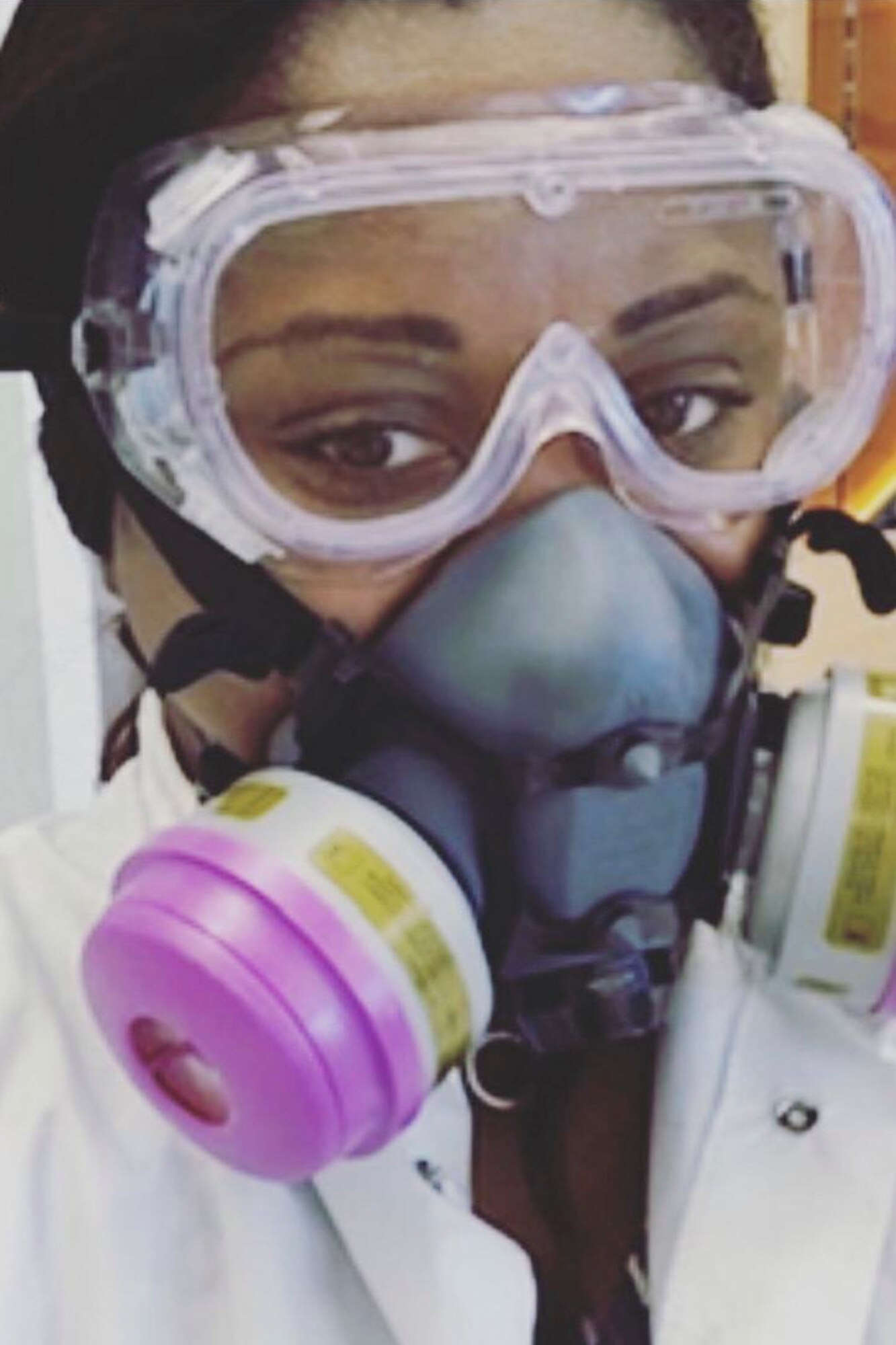 Captain Keisha Burrell, 514th Aerospace Medicine Squadron, clinical nurse, with the 514th Air Mobility Wing at Joint Base McGuire-Dix-Lakehurst, N.J. poses for a photo while wearing her personal protective equipment during the coronavirus pandemic in 2020. (U.S. Air Force courtesy photo)