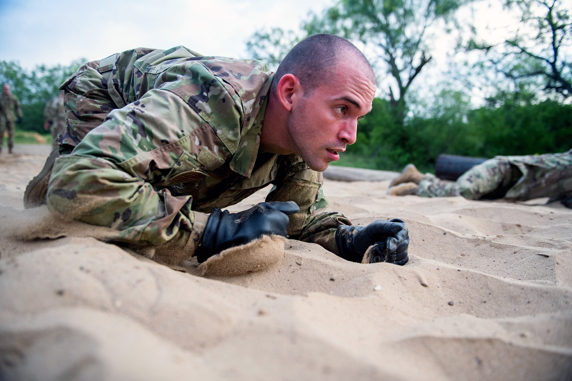 U.S. Air Force basic training trainee Jose Vasquez-Vera goes through the Leadership Reaction Course