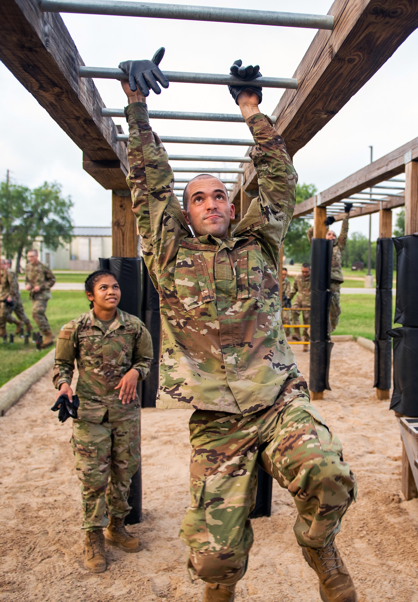 U.S. Air Force basic training trainee Jose Vasquez-Vera goes through the Leadership Reaction Course