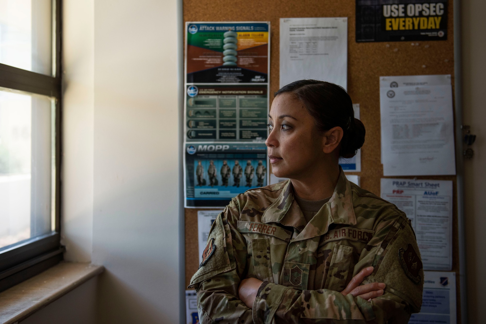 U.S. Air Force Chief Master Sgt. Maribeth Ferrer, 39th Medical Group Superintendent, stares out the window of her office June 22, 2020, at Incirlik Air Base, Turkey. Ferrer has been selected to serve as the 39th Air Base Wing's next command chief. (U.S. Air Force photo by Staff Sgt. Joshua Magbanua)