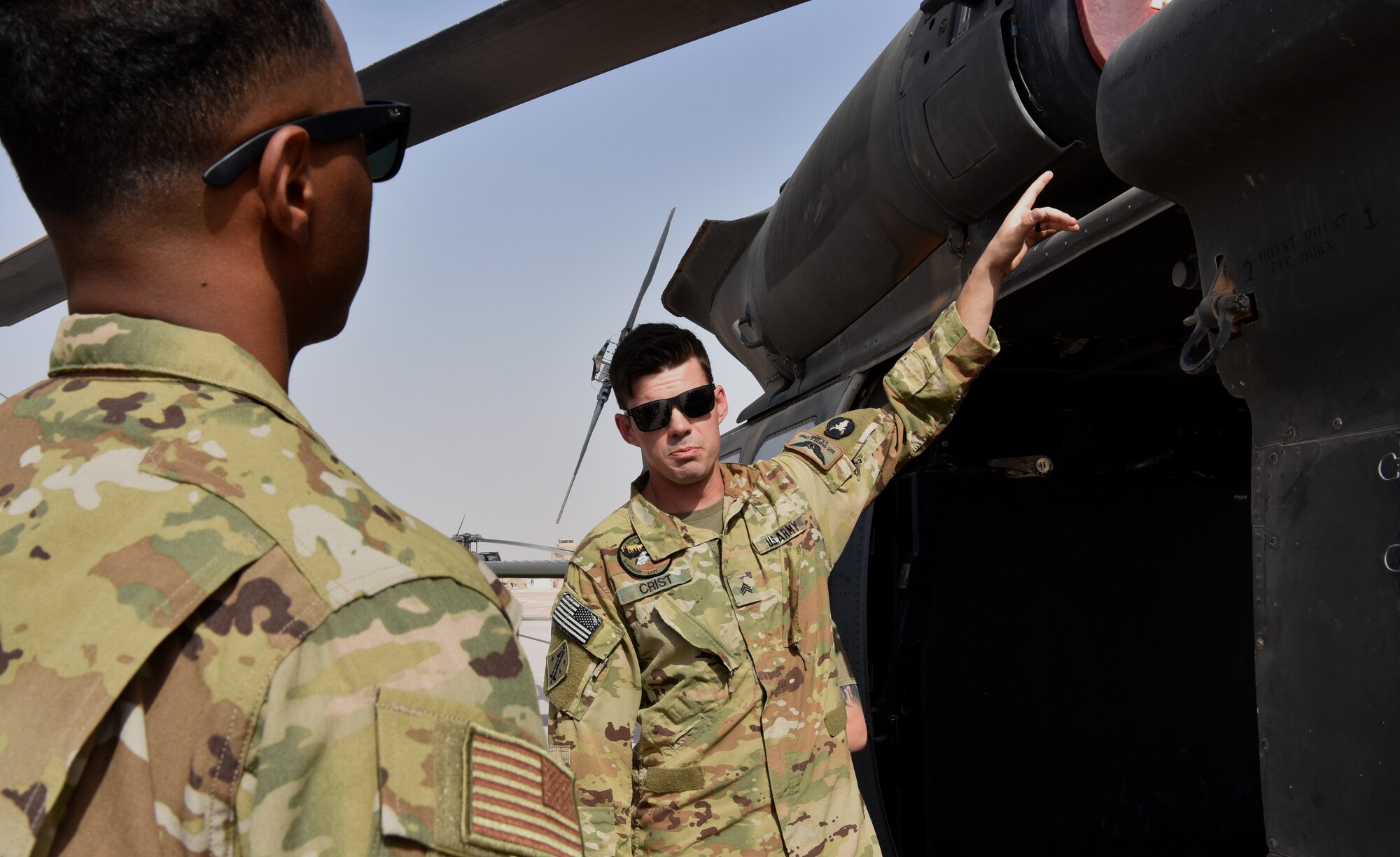 Members of the 378th Expeditionary Civil Engineering Squadron Fire Department receive familiarization training from members of Task Force Javelin at Prince Sultan Air Base, Kingdom of Saudi Arabia, June 25, 2020. The crucial training enables the 378th ECES to work seamlessly with members of TFJ to load critically injure or ill patients for Med-Evac, quickening the loading of patients while maintaining a safe environment for responders.