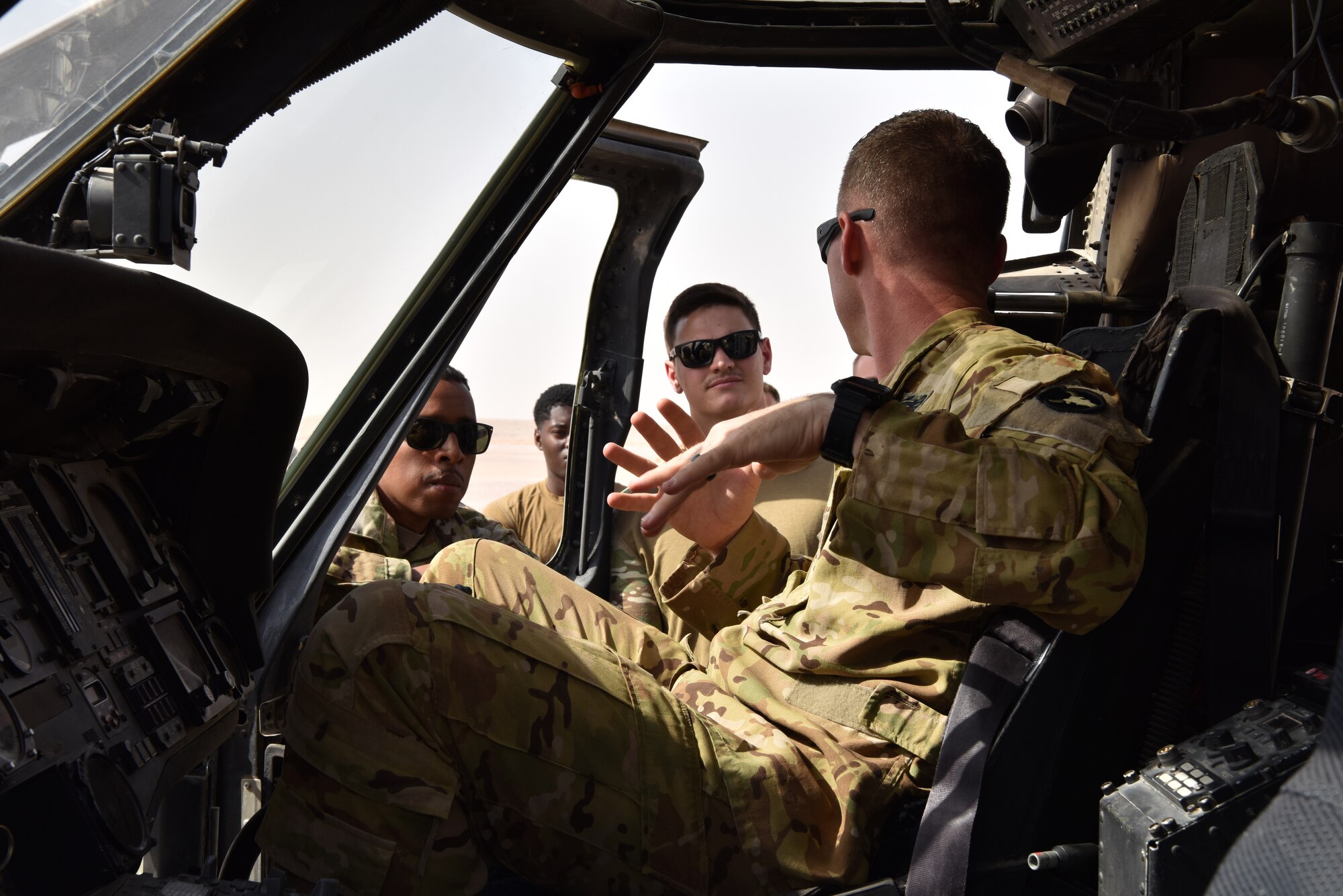 Members of the 378th Expeditionary Civil Engineering Squadron Fire Department receive familiarization training from members of Task Force Javelin at Prince Sultan Air Base, Kingdom of Saudi Arabia, June 25, 2020. The crucial training enables the 378th ECES to work seamlessly with members of TFJ to load critically injure or ill patients for Med-Evac, quickening the loading of patients while maintaining a safe environment for responders.