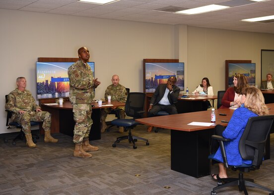 U.S. Air Force Col. James Finlayson, 17th Training Wing vice commander, introduces himself to local community members during a cybersecurity, community partnership conference at Angelo State University’s Rassman building, in San Angelo, Texas, June 23, 2020. To combat COVID-19, ASU restricted the briefing room occupancy, required attendees to wear masks, and sanitized the classroom surfaces prior to the event. (U.S. Air Force photo by Airman 1st Class Abbey Rieves)