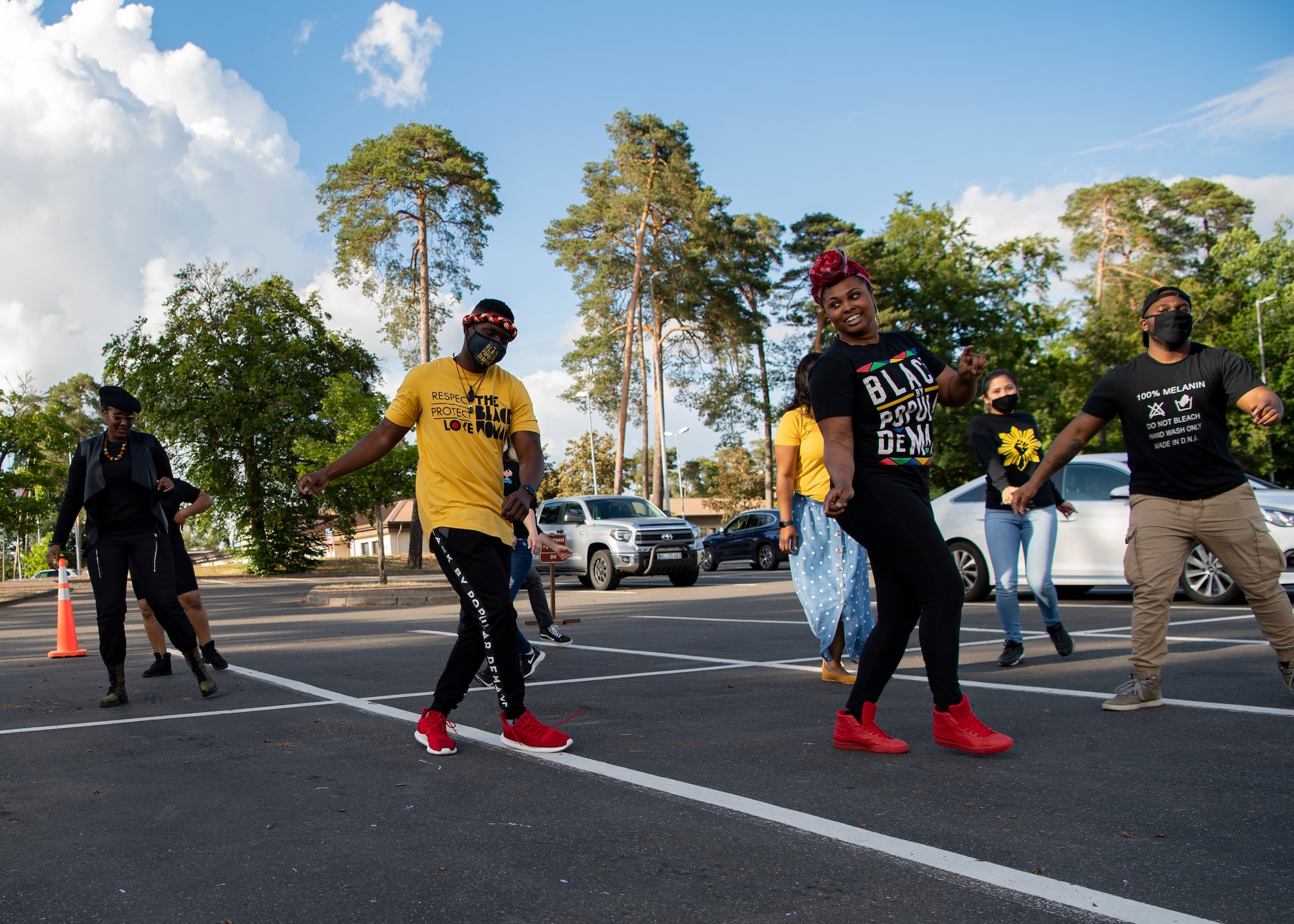 Kaiserslautern Military Community members perform a dance in celebration of Juneteenth at Ramstein Air Base, Germany, June 19, 2020.