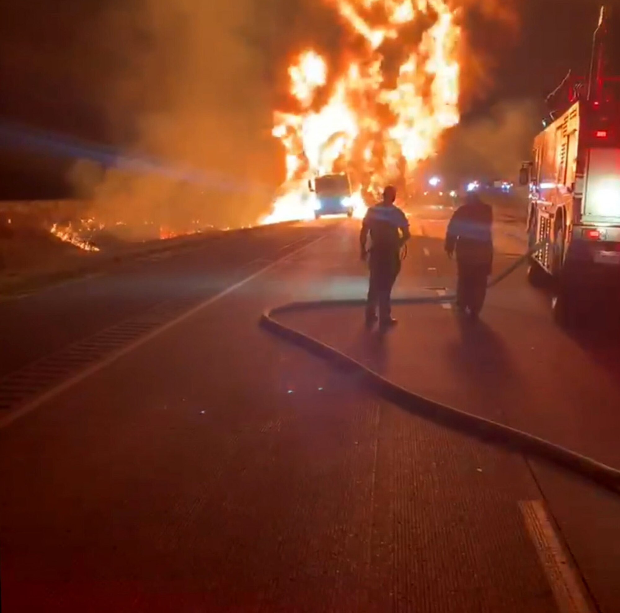 Grissom firefighters prepare to extinguish a tanker fire engulfed in flames on U.S. Highway 31 in Howard County, Indiana, June 19, 2020. Grissom FD assisted Kokomo FD in extinguishing the fuel fire, resulting in zero injuries.  (U.S. Air Force photo/Jason Cahill)