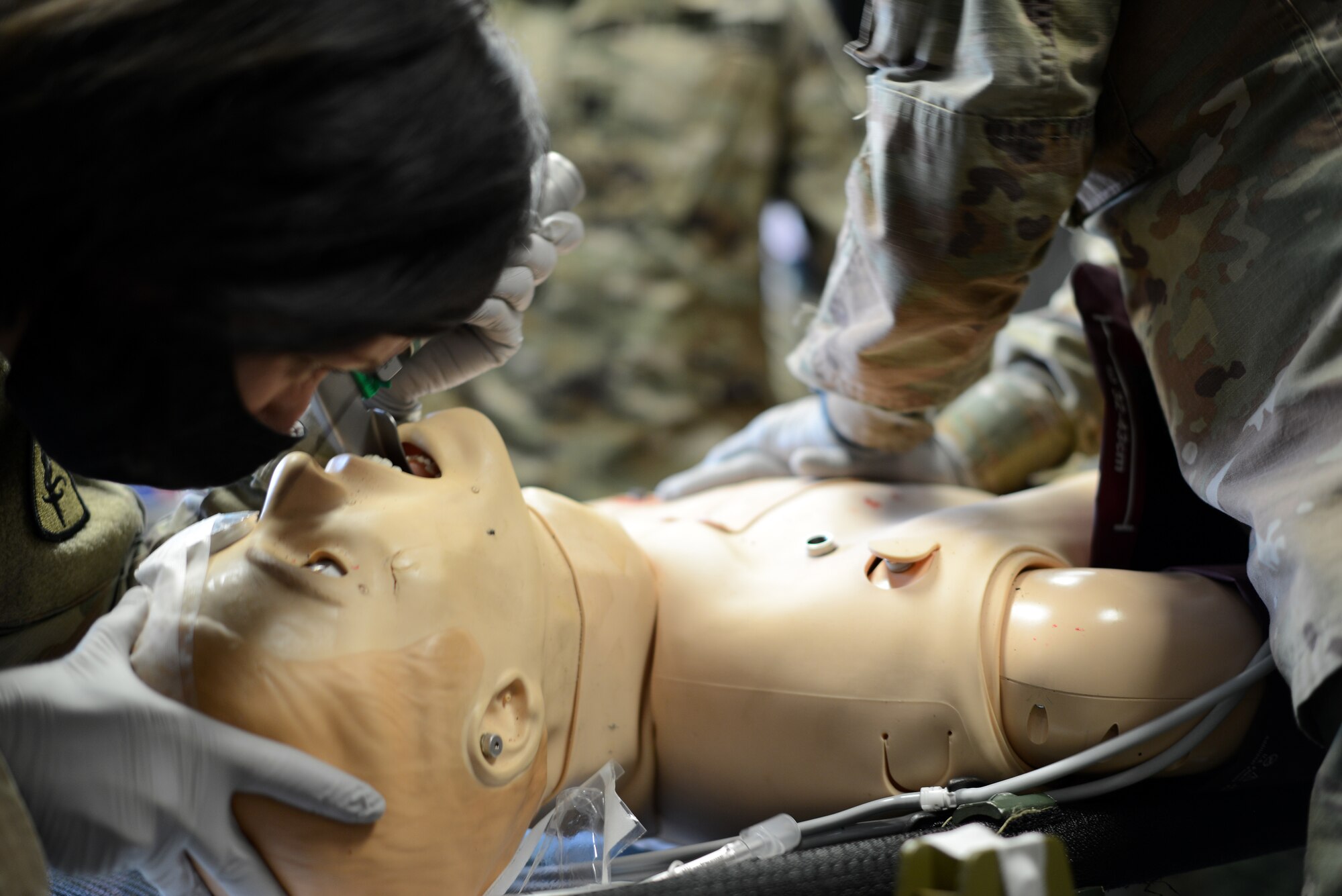 U.S. Army Capt. Jennifer Hensel, 67th Forward Resuscitative Surgical Team Nurse Anesthetist, intubates a patient during a training scenario at the Medical Simulation Training Center, Ramstein Air Base, June 19, 2020.