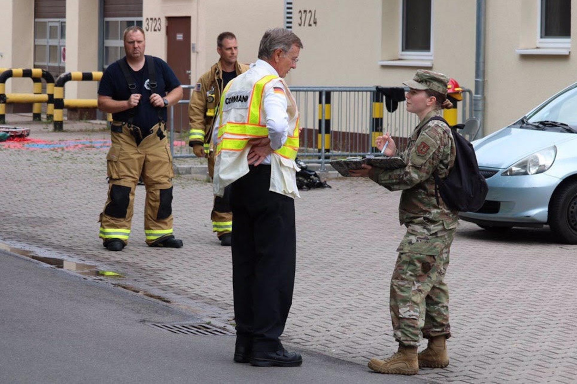 U.S. Air Force Master Sgt. Jessica Clayton, 786th Civil Engineer Squadron Emergency Management Operations noncommissioned officer in charge, briefs response options to the incident commander at Landstuhl Regional Medical Center, Germany, June 16, 2020.