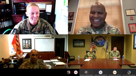 Five Soldiers participate in a media round table via video chat with the screen split into four squares.