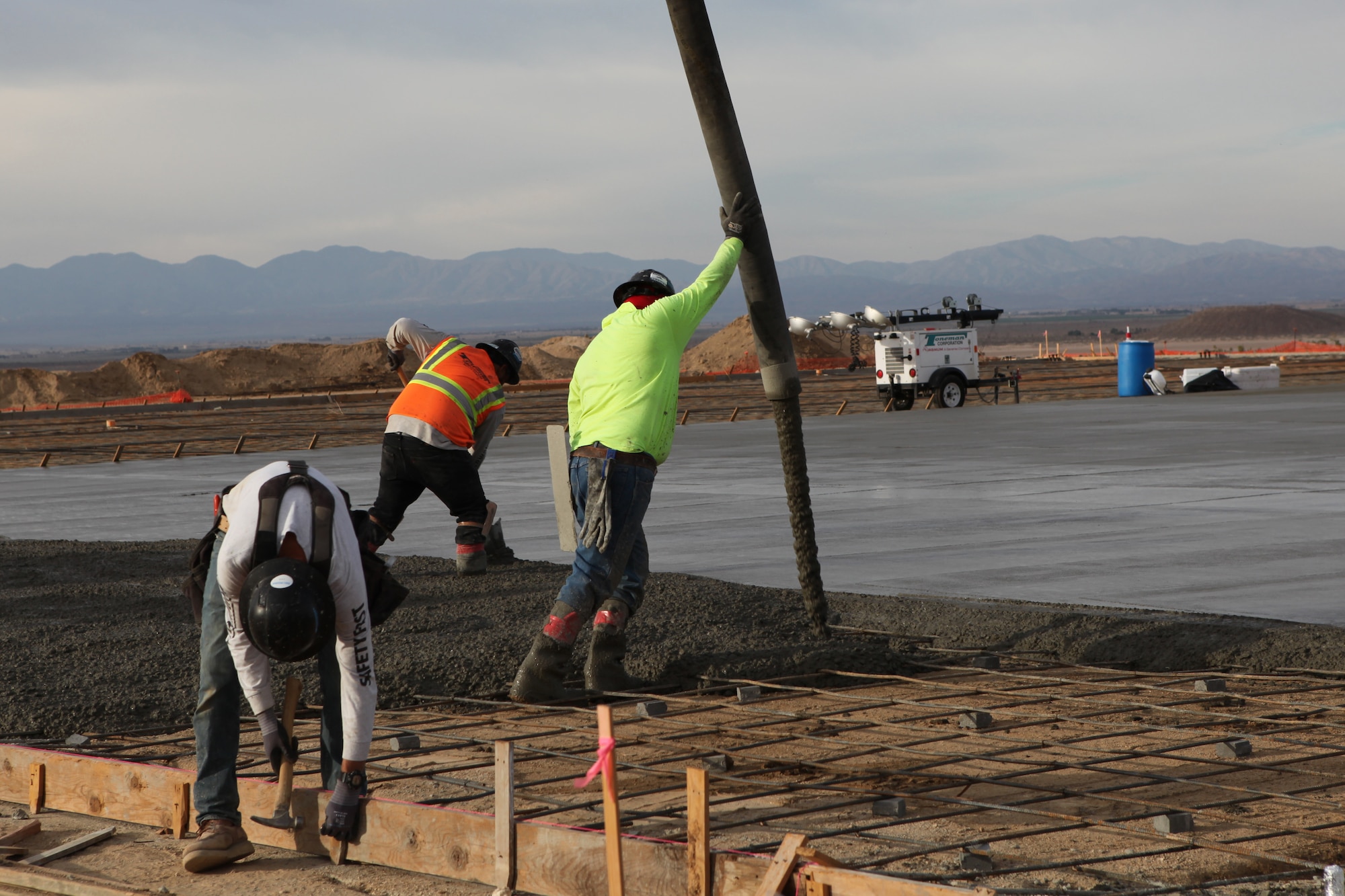 Concrete is poured, June 25, at the site of the future Air Force Flight Test Museum at Edwards Air Force, which will be located just outside of the  Base’s West Gate. (Air Force photo by Grady Fontana)