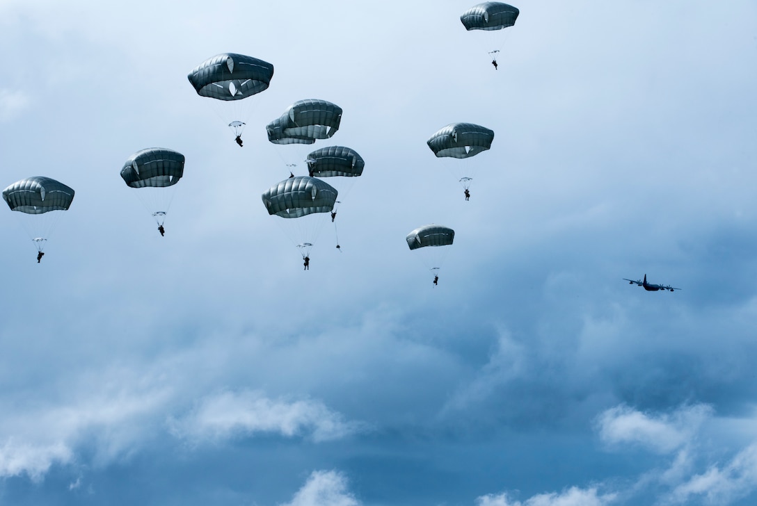 Battlefield Airmen jumping from a HC-130J Combat King ll
