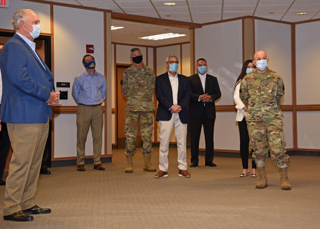 U.S. Air Force Col. Tony England, 17th Mission Support Group commander, and Col. Andres Nazario, 17th Training Wing commander, wear face masks while attending a community partnership facility tour at Angelo State University, in San Angelo, Texas, June 23, 2020. Though there are several existing agreements and understandings between Goodfellow Air Force Base and ASU, members of Goodfellow Air Force Base introduced themselves to the community members and discussed how to potentially integrate and share cybersecurity resources with community partners. (U.S. Air Force photo by Airman 1st Class Abbey Rieves)