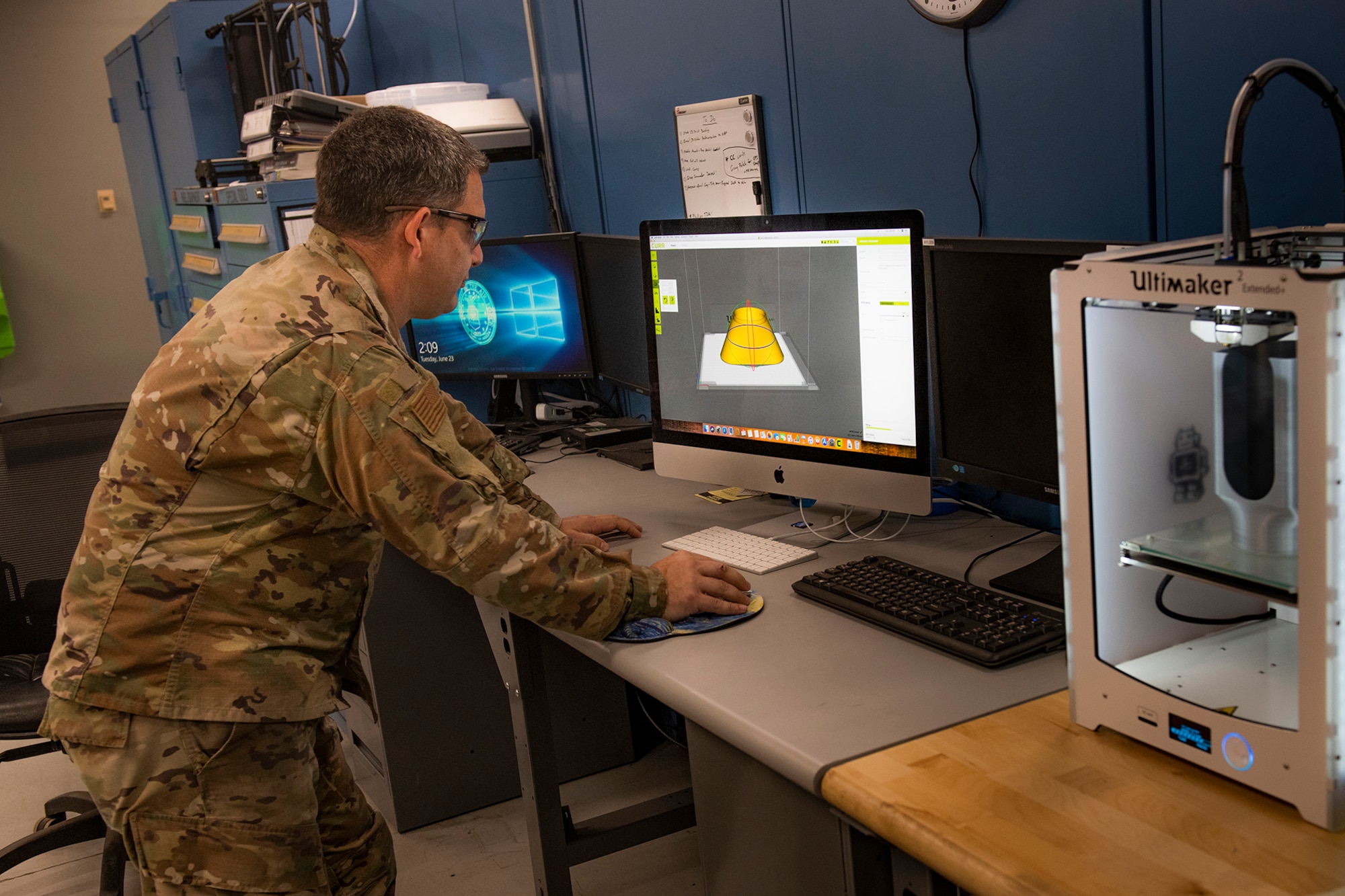 Tech. Sgt. Michael Resseguie, 919th Special Operations Maintenance Squadron metals technology craftsman, uses graphic modeling software to print a piece of air duct at Duke Field, Florida, June 23, 2020.