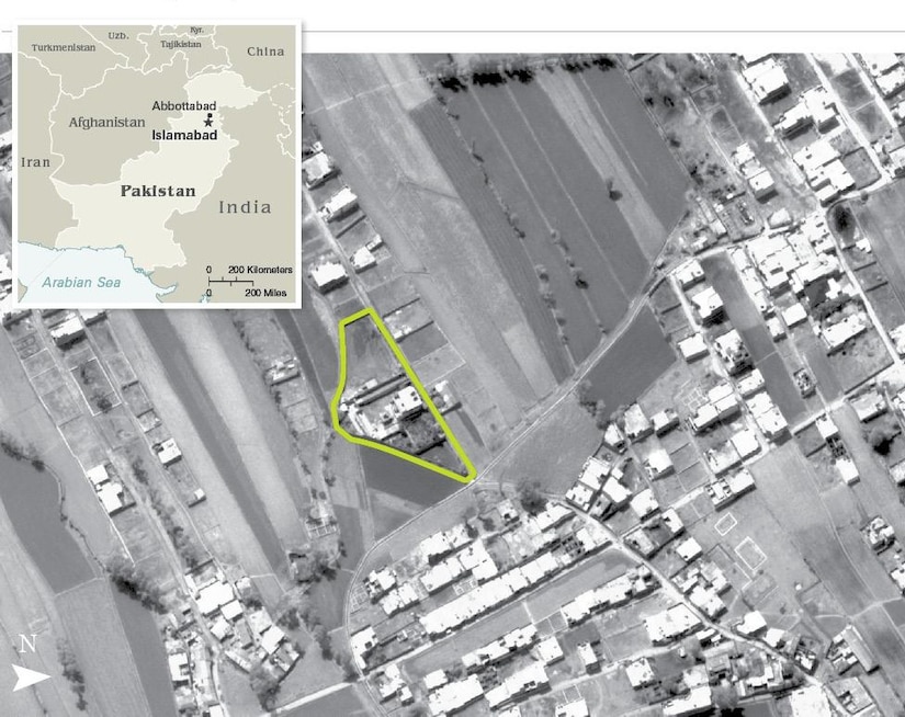 An aerial photo of a compound with an inset of a map of Pakistan.