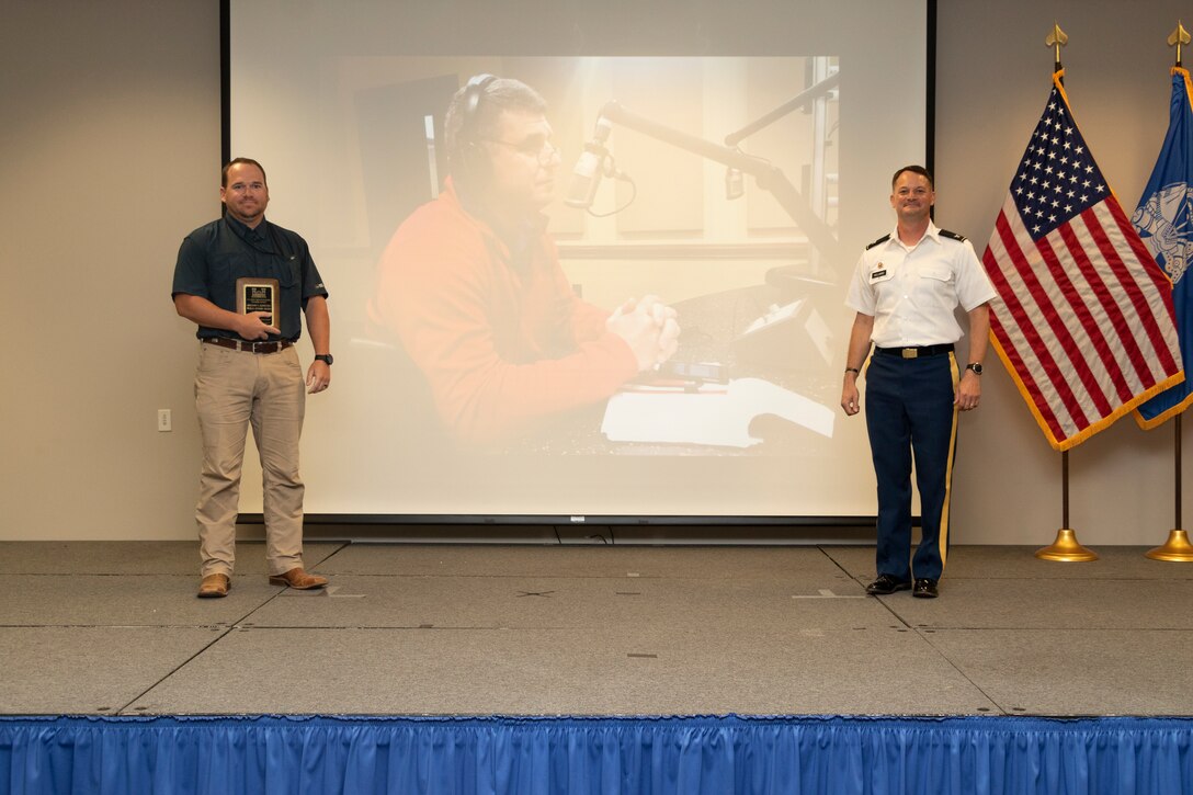 U.S. Army Corps of Engineers (USACE) Vicksburg District chief of Water Management Drew Smith (left) receives the inaugural Gregory C. Raimondo Public Affairs Award from district commander Col. Robert Hilliard during the district's Engineer's Day Award Ceremony June 25, 2020. Raimondo, the district's former public affairs chief, died in 2018.