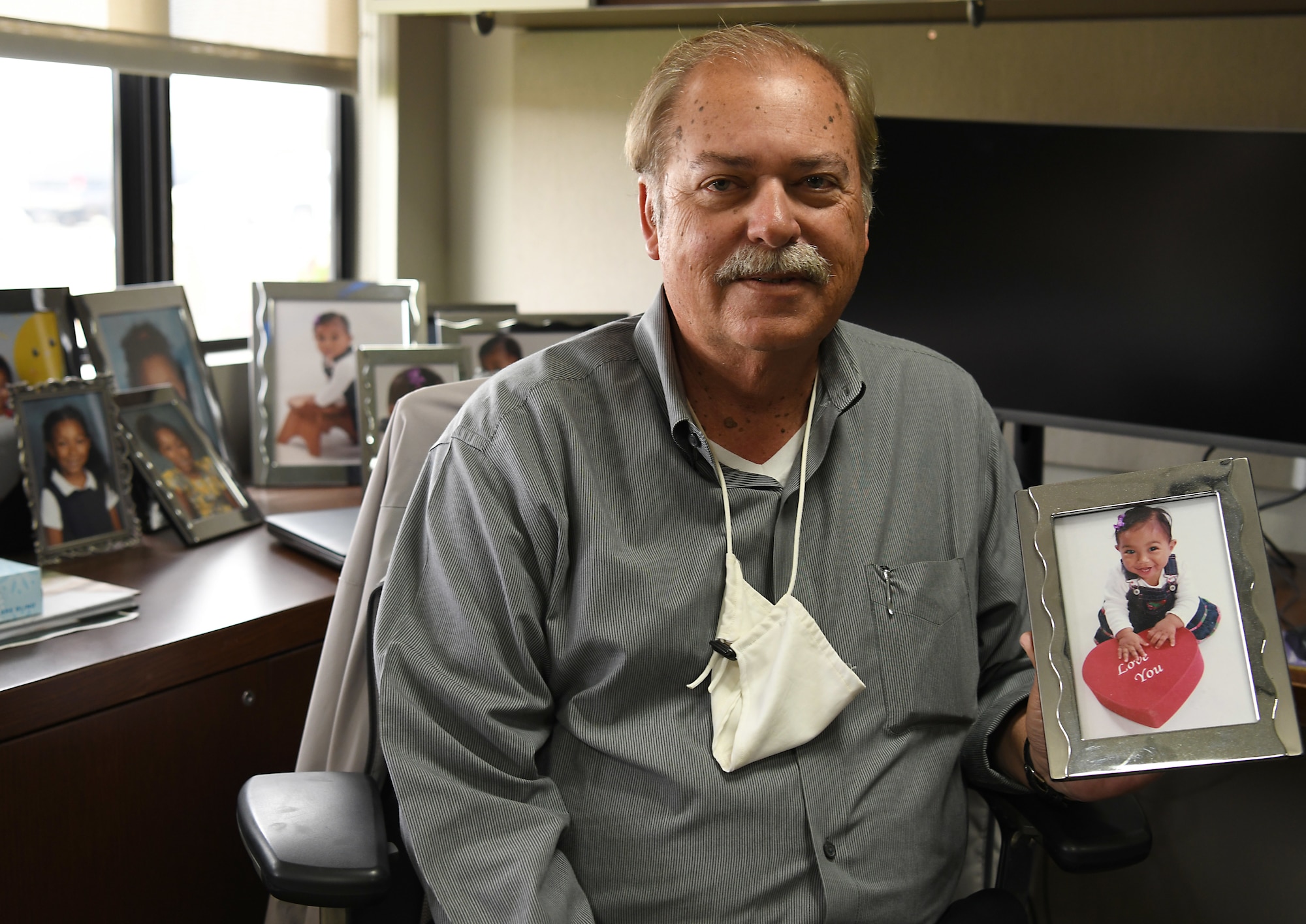 Richard Cote, 30th Civil Engineer Squadron deputy commander, holds a picture of his granddaughter, Jaiden, June 24, 2020, at Vandenberg Air Force Base, Calif.