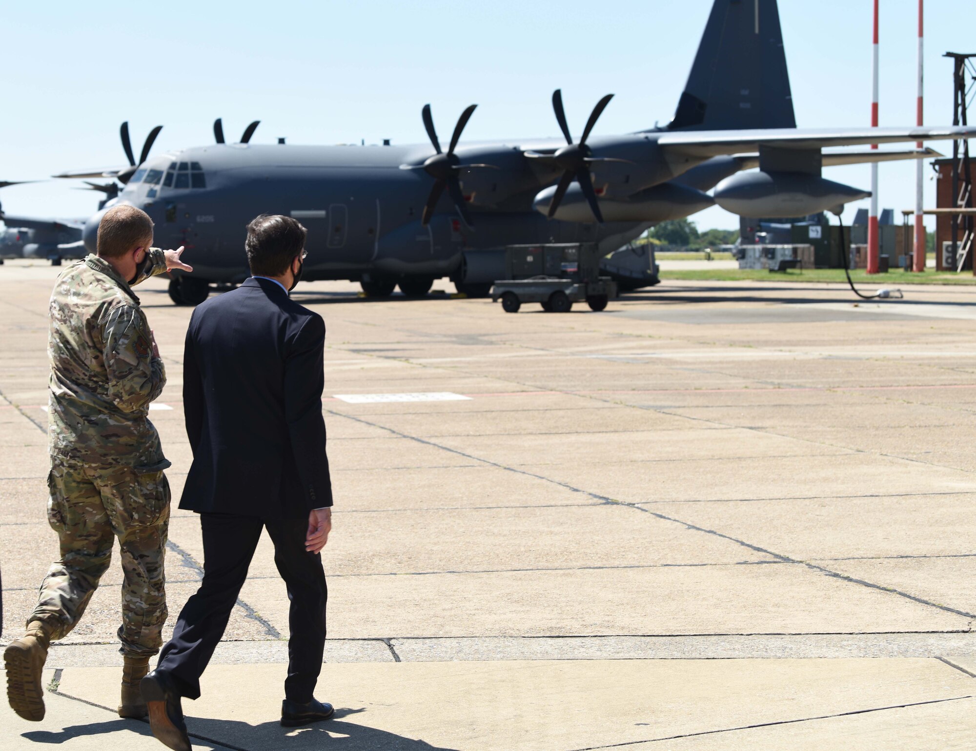 Colonel Clay Freeman, 352nd Special Operations Wing commander, speaks with U.S. Secretary of Defense Dr. Mark T. Esper during a visit to RAF Mildenhall, England, June 25, 2020. Esper toured the air traffic control tower, static displays of a CV-22 Osprey, RC-135 Rivet Joint and spent time speaking with both officer and enlisted Airmen during his tour. (U.S. Air Force photo by Senior Airman Brandon Esau)