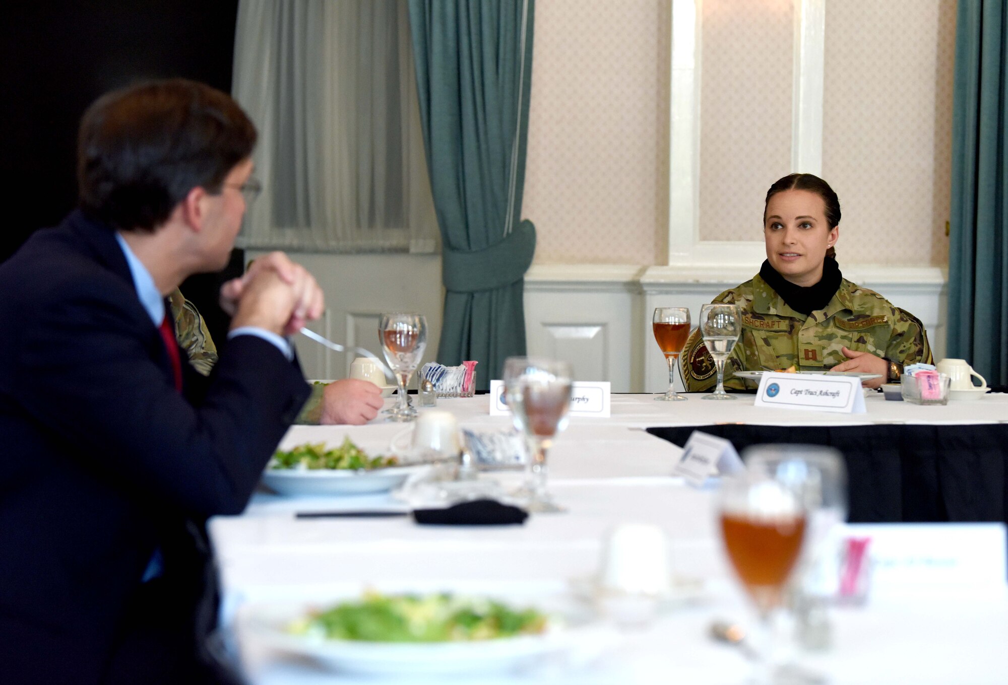 Captain Traci Ashcraft, 100th Mission Support Group executive officer, speaks with U.S. Secretary of Defense Dr. Mark T. Esper during a visit to RAF Mildenhall, England, June 25, 2020. Esper toured the air traffic control tower, static displays of a CV-22 Osprey, RC-135 Rivet Joint and spent time speaking with both officer and enlisted Airmen during his tour. (U.S. Air Force photo by Senior Airman Brandon Esau)