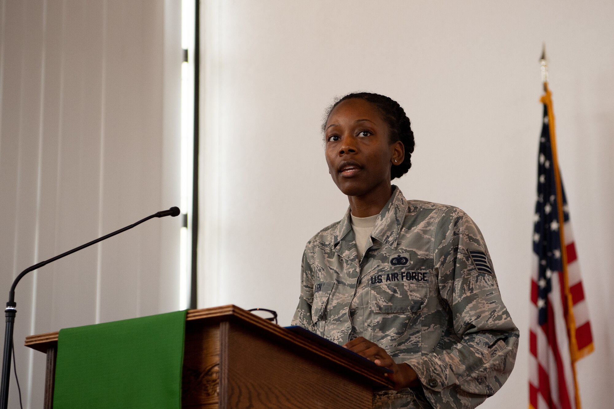 U.S. Air Force Tech Sgt. Marquita Allen, U.S. Air Forces in Europe and Air Forces Africa commander enlisted executive, gives a speech at the Juneteenth: Vigil for Healing event at Ramstein Air Base, Germany, June 19, 2020.