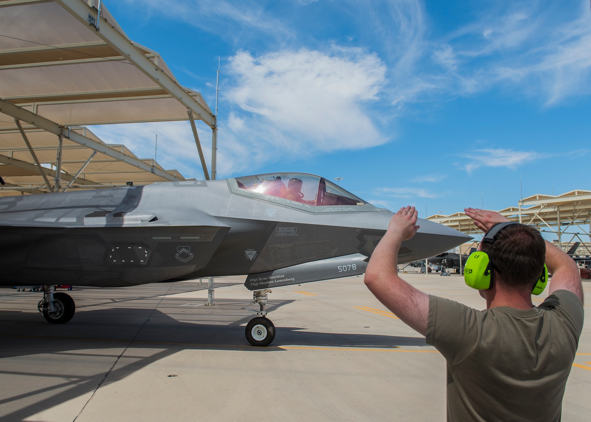 Maj. Tyler McBride, 62nd Fighter Squadron F-35A Lightning II instructor pilot, leaves his spot for a Pride Month flyby June 26, 2020, at Luke Air Force Base, Ariz.