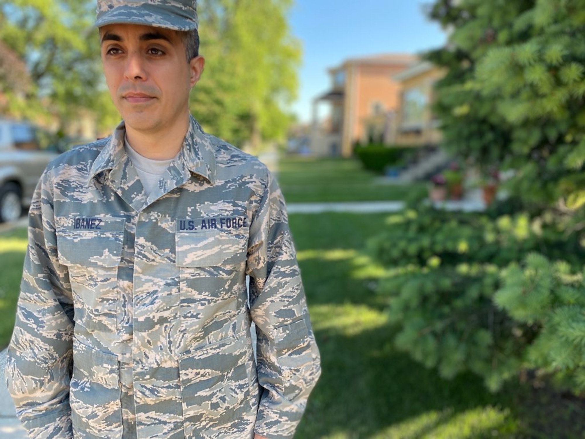 Tech. Sgt. Brandon Ibanez, a cyber intelligence analyst with the 854th Combat Operations Squadron, stands in uniform for a photo outside his home in Chicago, Illinois, June 15, 2020. As a Gladiator in the 960th Cyberspace Wing, it’s not a requirement to don the traditional uniform of ancient Roman fighters, and it would be impractical because the enemy in cyberspace doesn’t attack using guns or spears. (Courtesy photo by Anna Czekaj)