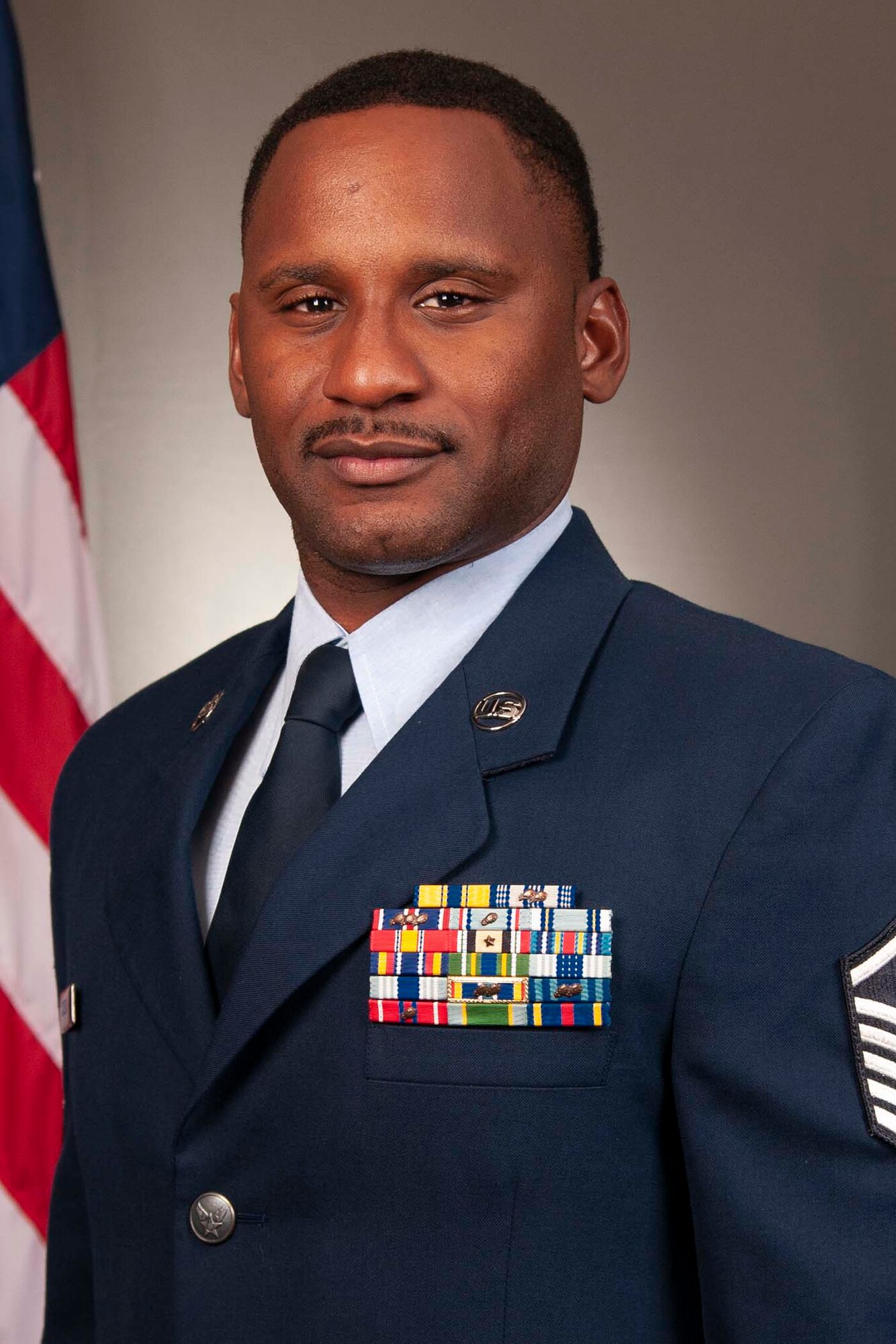 Carlos Jackson poses for a photo in his Air Force uniform.