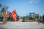 A U.S. Marine salute the unit colors during the opening ceremony of SPMAGTF-SC, June 26.