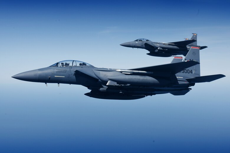 U.S. Air Force F-15E Strike Eagles assigned to the 48th Fighter Wing conduct bilateral interoperability training with Royal Netherlands Air Force F-16 Fighting Falcons over the North Sea, June 19, 2020. Interoperability training remains a symbol of the shared commitment between the Netherlands, the U.S. and NATO to maintain the continued security of Europe. (U.S. Air Force photo by Airman 1st Class Anthony Clingerman)