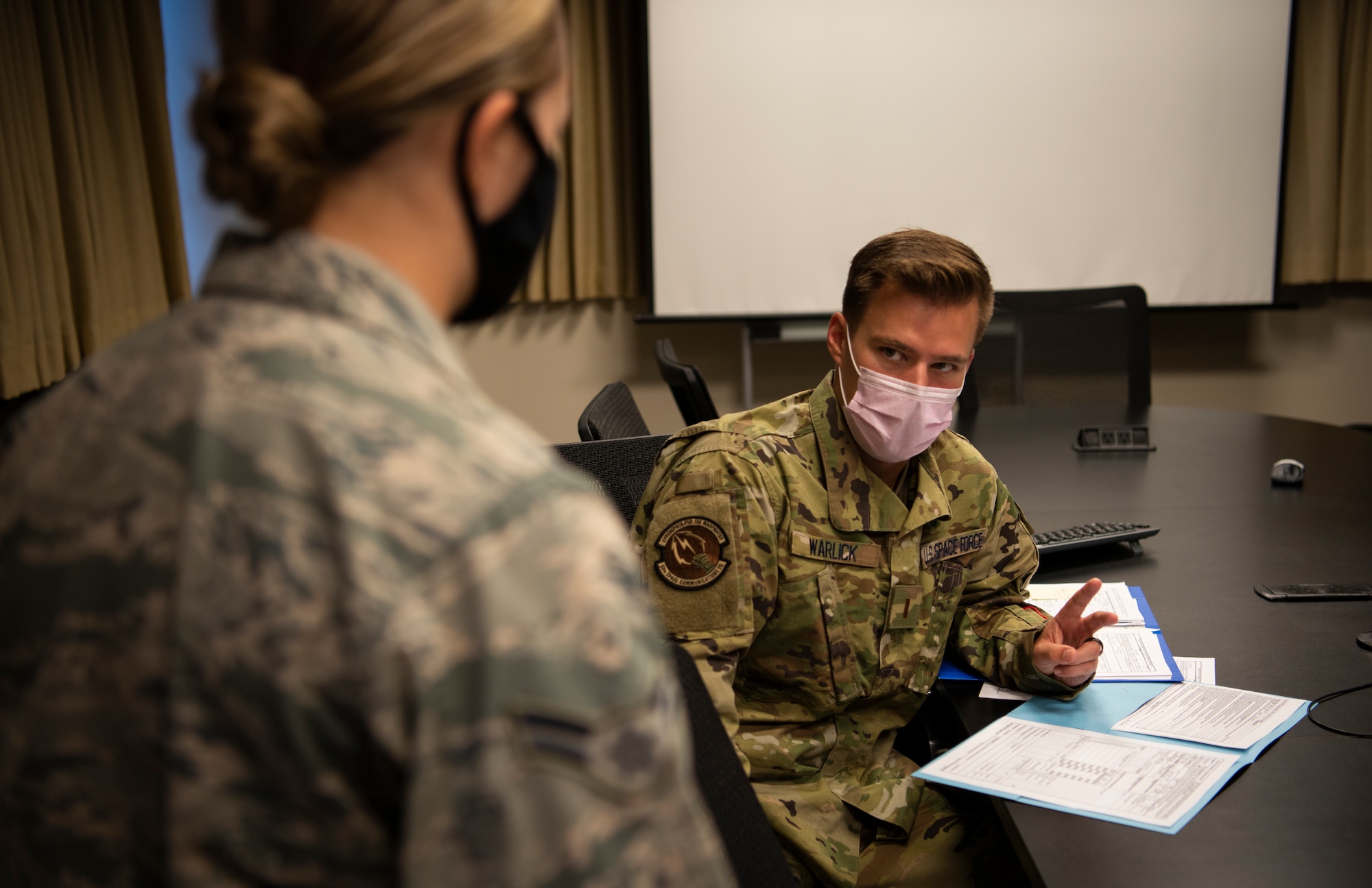 Second Lt. Zachary Warlick, 50th Space Communications Squadron senior watch officer, completes his in-processing requirements at Schriever Air Force Base, Colorado, June 22, 2020. After earning his U.S. Space Force commission from the U.S. Air Force Academy, Colorado, Warlick became the first member of the USSF to be assigned to Schriever. (U.S. Air Force photo by Airman 1st Class Amanda Lovelace)