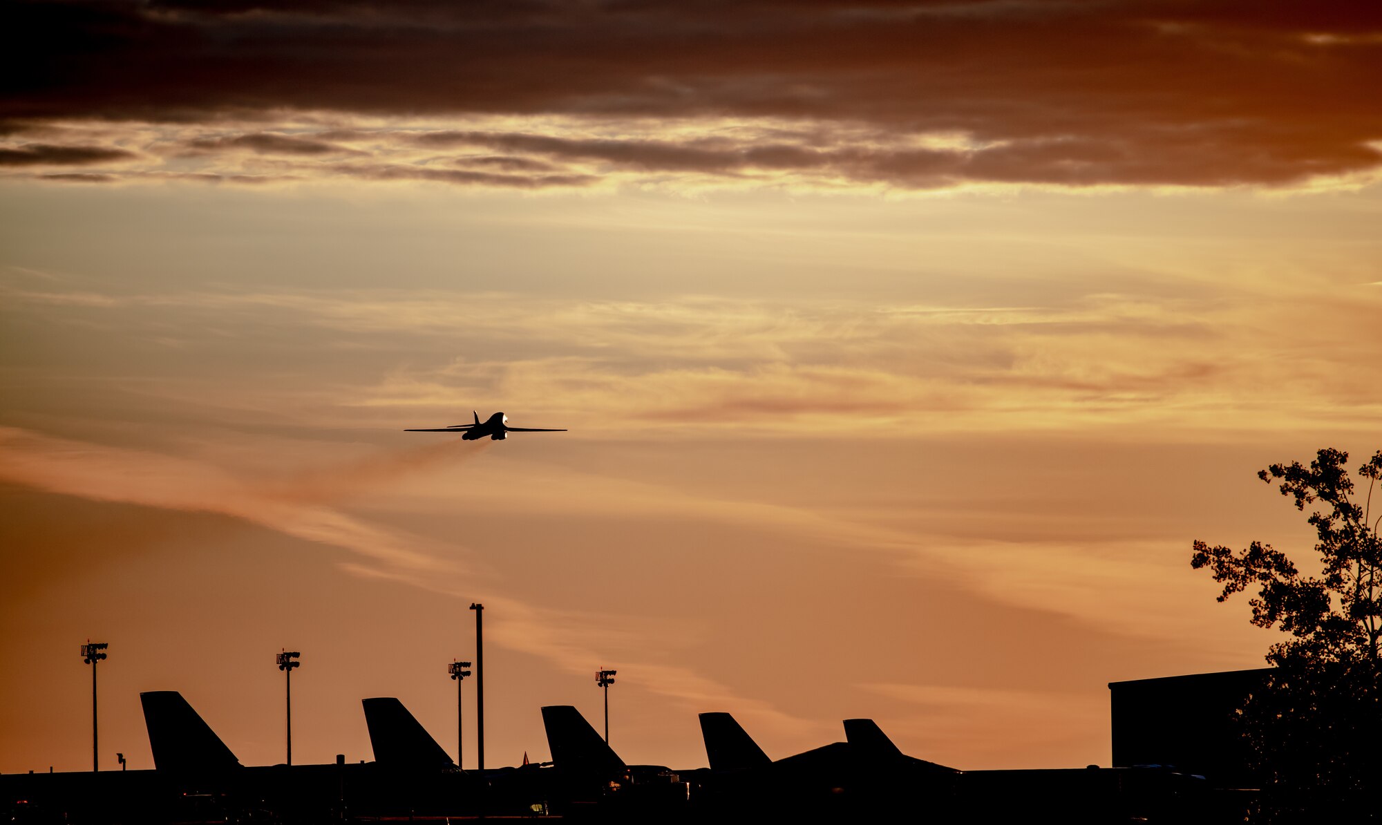 A B-1B Lancer flies above Minot Air Force Base, N.D., June 22, 2020. The B-1 can travel faster than the speed of sound and carry a payload of 75,000 pounds. (U.S. Air Force photo by Airman 1st Class Jesse Jenny)