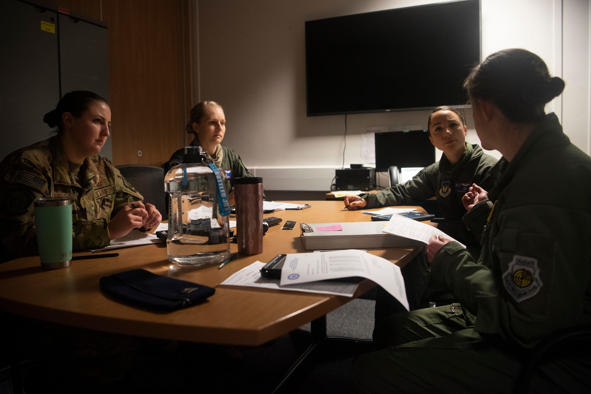 Aircrew members from the 351st Air Refueling Squadron conduct a mission briefing before supporting a strategic bomber mission at RAF Mildenhall, England, June 18, 2020. Four KC-135 Stratotankers provided in-air refueling for B-2 Spirit stealth bombers from the 509th Bomb Wing at Whiteman Air Force Base, Missouri. (U.S. Air Force photo by Airman 1st Class Joseph Barron)