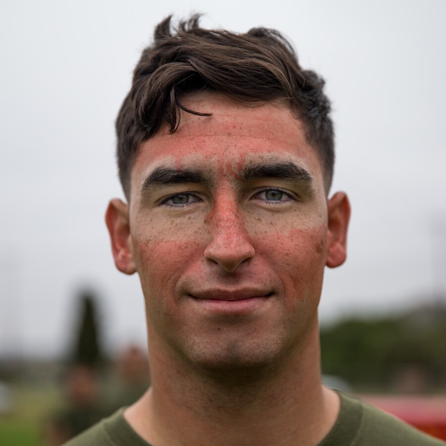 U.S. Marine Corps Lance Cpl. Israel Garcia, a field artillery cannoneer with India Battery, Battalion Landing Team 1/4, 15th Marine Expeditionary Unit, poses for a portrait before receiving oleoresin capsicum spray during a non-lethal weapons course at Marine Corps Base Camp Pendleton, California, June 23, 2020. The non-lethal weapons course teaches Marines escalation of force tactics, techniques and procedures. (U.S. Marine Corps photo by Lance Cpl. Brendan Mullin)