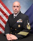 Master Chief Brian Adams , U.S. Navy official portrait.
