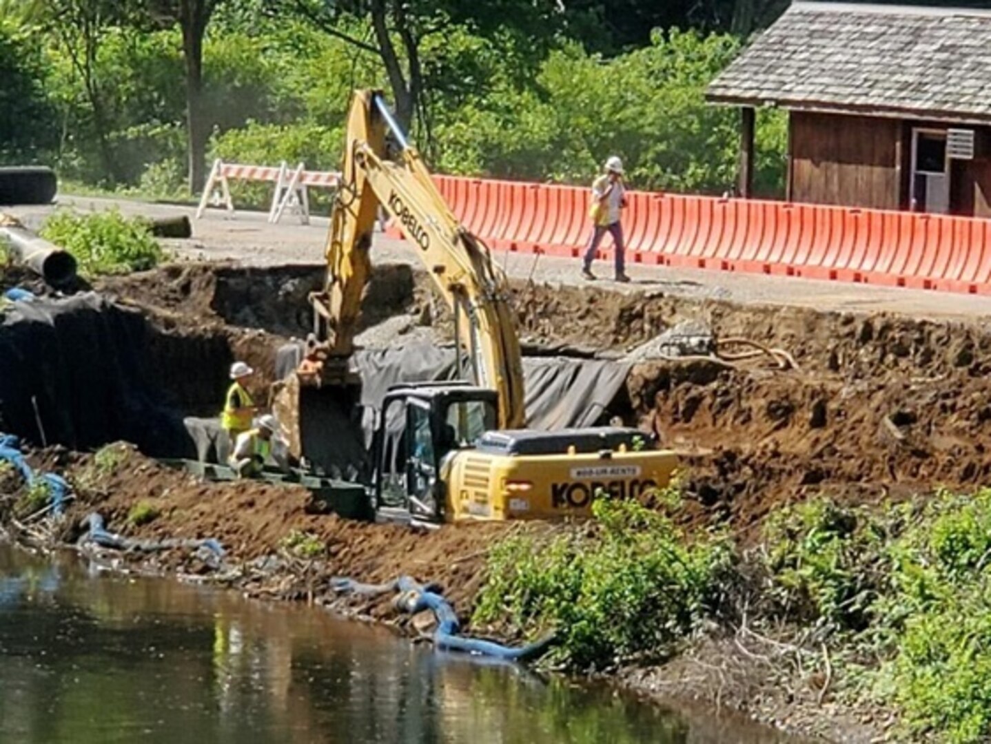 Heavy construction machinery continues repairs along the access road to a dam in Tionesta, Pennsylvania June 25, 2020.
