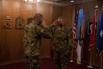 Lt. Col. Woodrow Miner, commander, 204th Maneuver Enhancement Brigade, is promoted to the rank of colonel during a ceremony at Utah National Guard headquarters in Draper, Utah,  June 17, 2020, with a date of rank May 21, 2020.