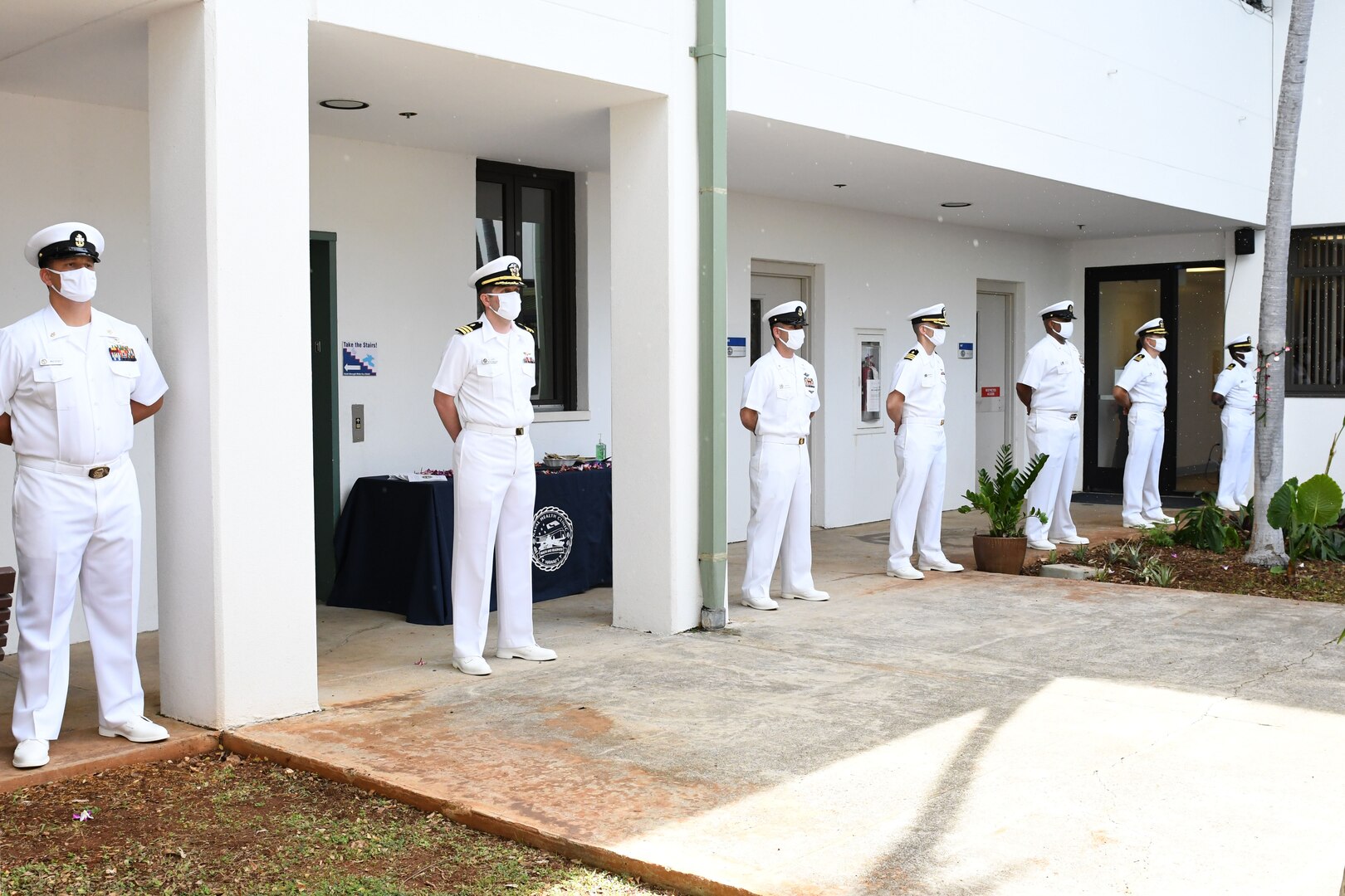 Sailors are posted on the rails around the ceremony