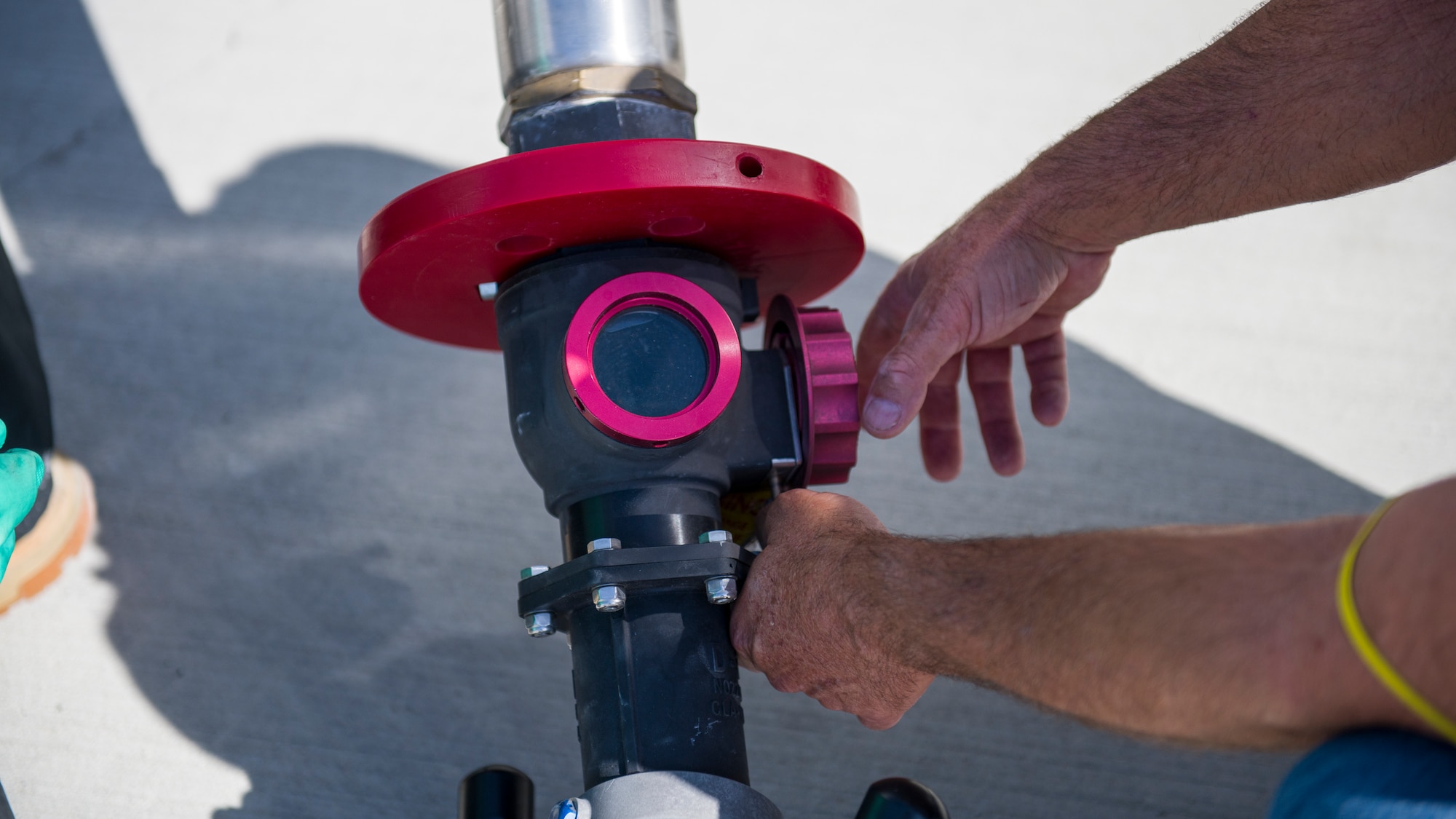 One of the Large Capacity Refuel Vehicle’s new features include a fuel filter near the nozzle of the hose to facilitate easier removal and replacement. (Air Force photo by Giancarlo Casem)