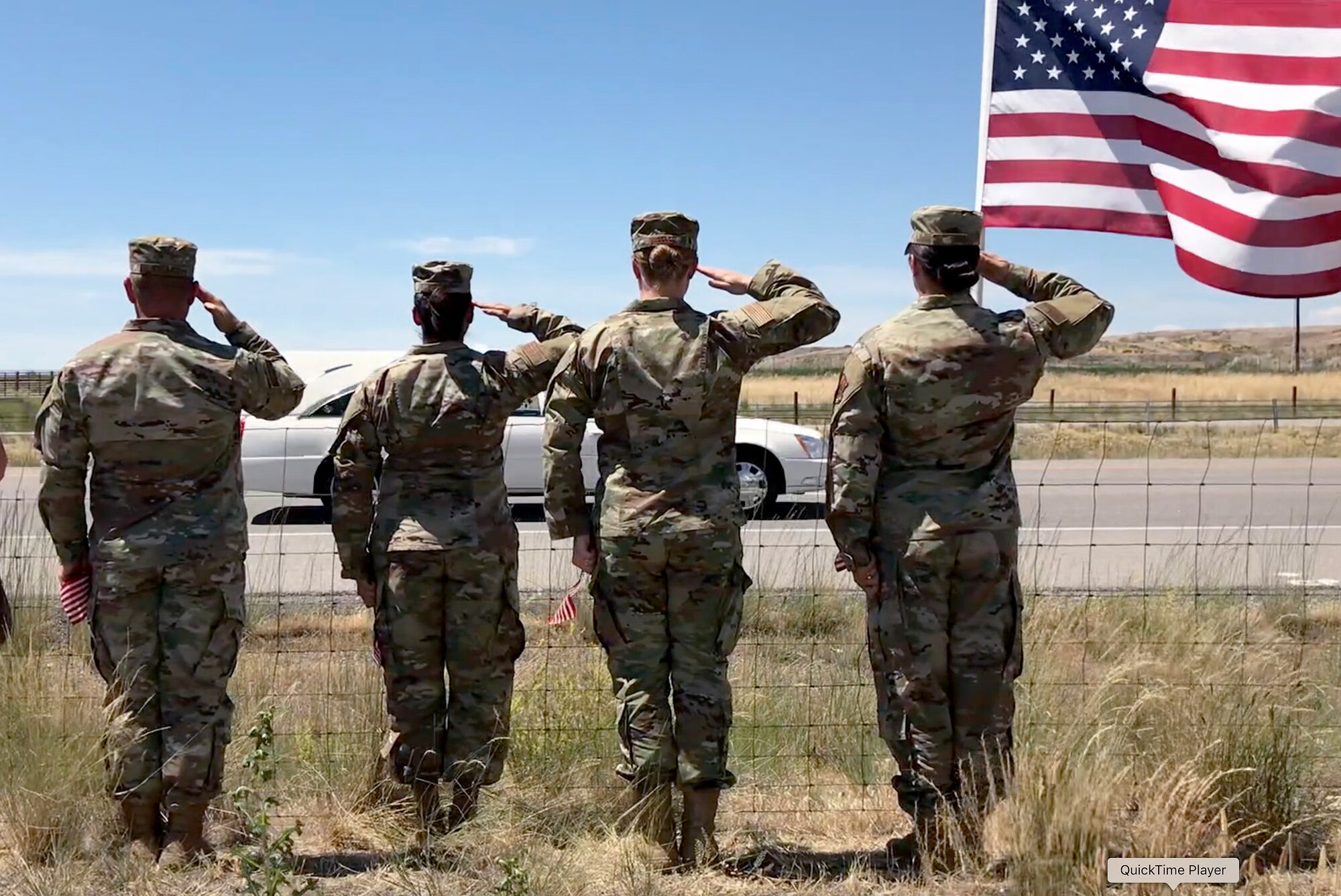 Reservists from the 419th Fighter Wing salute during a procession for 1st Lt. Kenneth "Kage" Allen, a fellow Utahn and Air Force pilot killed in an F-15 crash earlier this month.