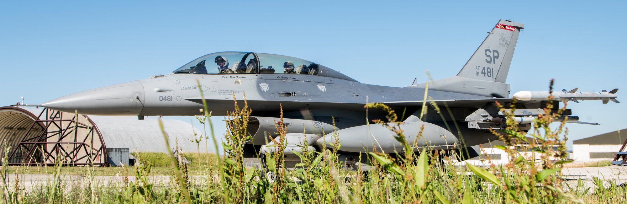 Capt. Daniel Cook, 480th Fighter Squadron pilot, front, and Gen. Jeff Harrigian, U.S. Air Forces in Europe and Air Forces Africa commander, prepare for take-off at Spangdahlem Air Base, Germany, June 25, 2020. Harrigian visited Spangdahlem AB during an Agile Combat Employment exercise, which envisions the use of agile operations to generate resilient airpower in a contested environment. (U.S. Air Force photo by Airman 1st Class Alex Miller)