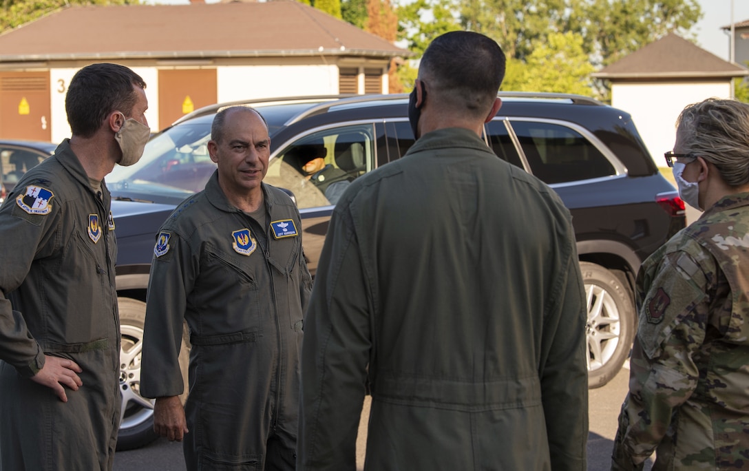 52nd Fighter Wing leadership greets Gen. Jeff Harrigian, second from left, U.S. Air Forces in Europe and Air Forces Africa commander, before the start of an Agile Combat Employment exercise at Spangdahlem Air Base, Germany, June 25, 2020. Engagement incorporating ACE concepts in less-than-optimal environments improves interoperability among forces and helps allies and partners increase their capabilities. (U.S. Air Force photo by Senior Airman Branden Rae)
