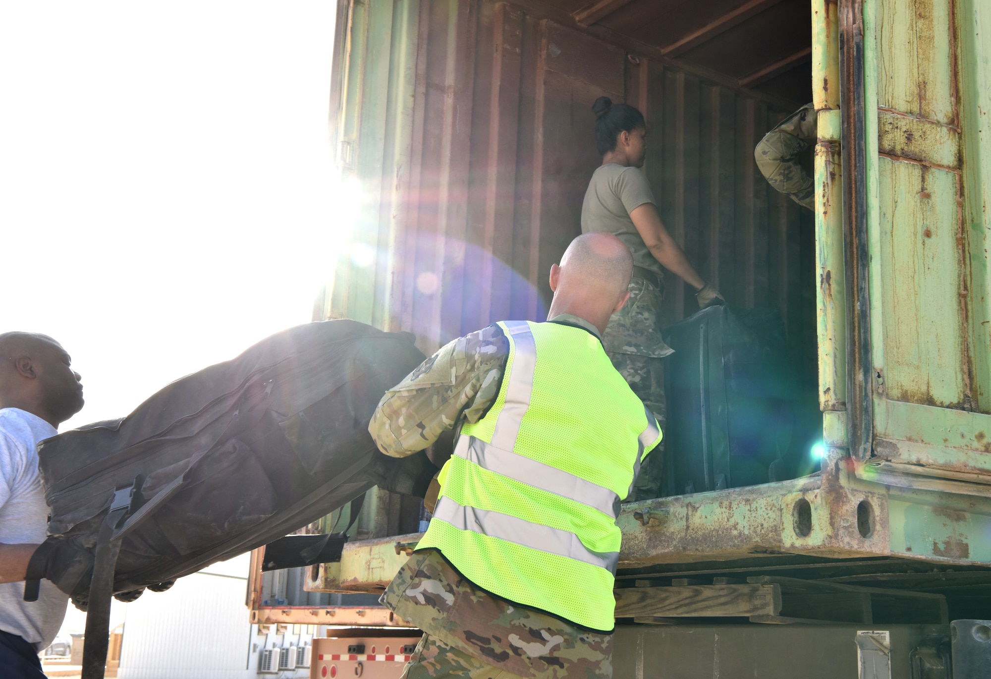 The 378th Expeditionary Logistics Readiness Squadron moves bags at Prince Sultan Air  Base, Kingdom of Saudi Arabia, June 28, 2020.