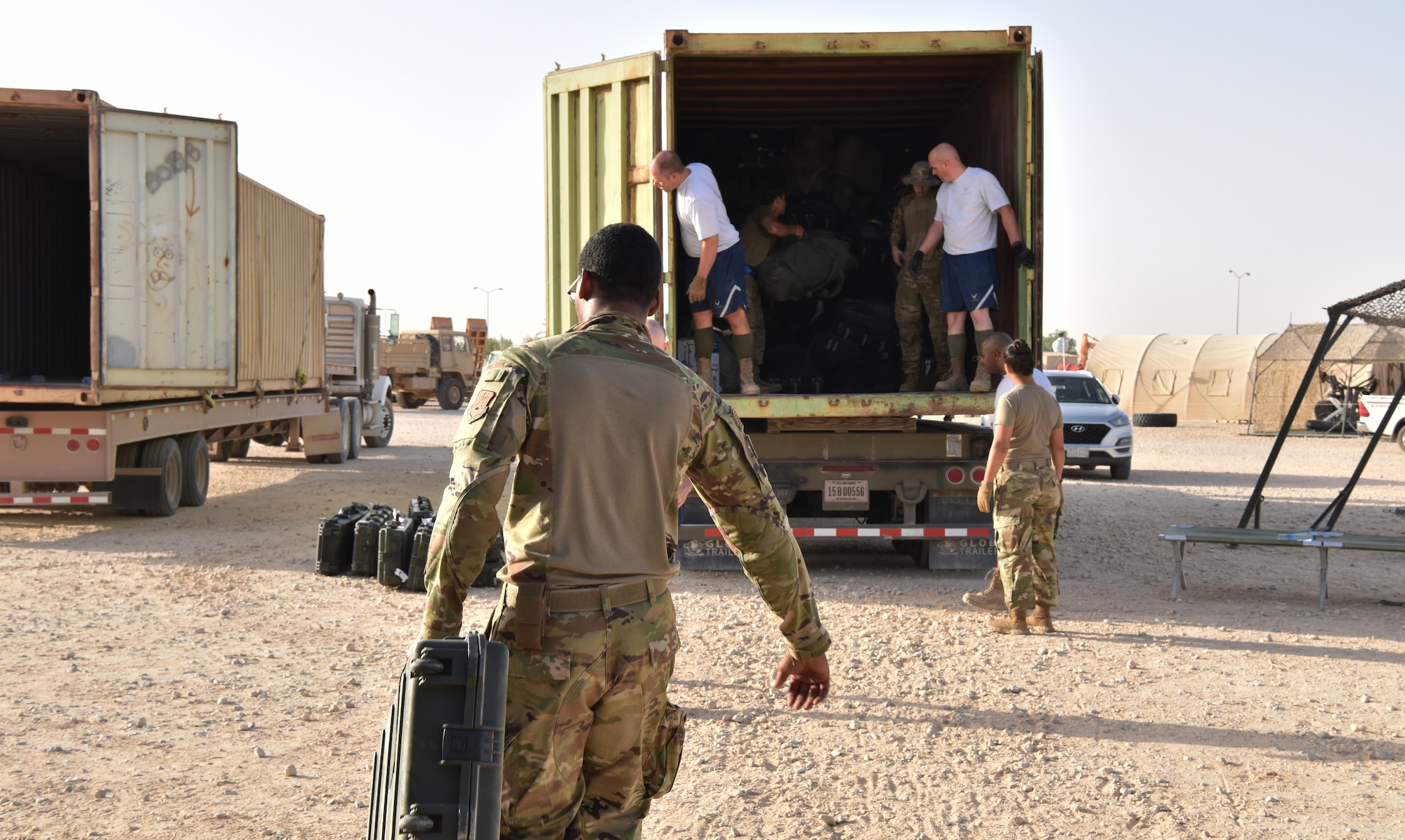 The 378th Expeditionary Logistics Readiness Squadron moves bags at Prince Sultan Air  Base, Kingdom of Saudi Arabia, June 28, 2020.