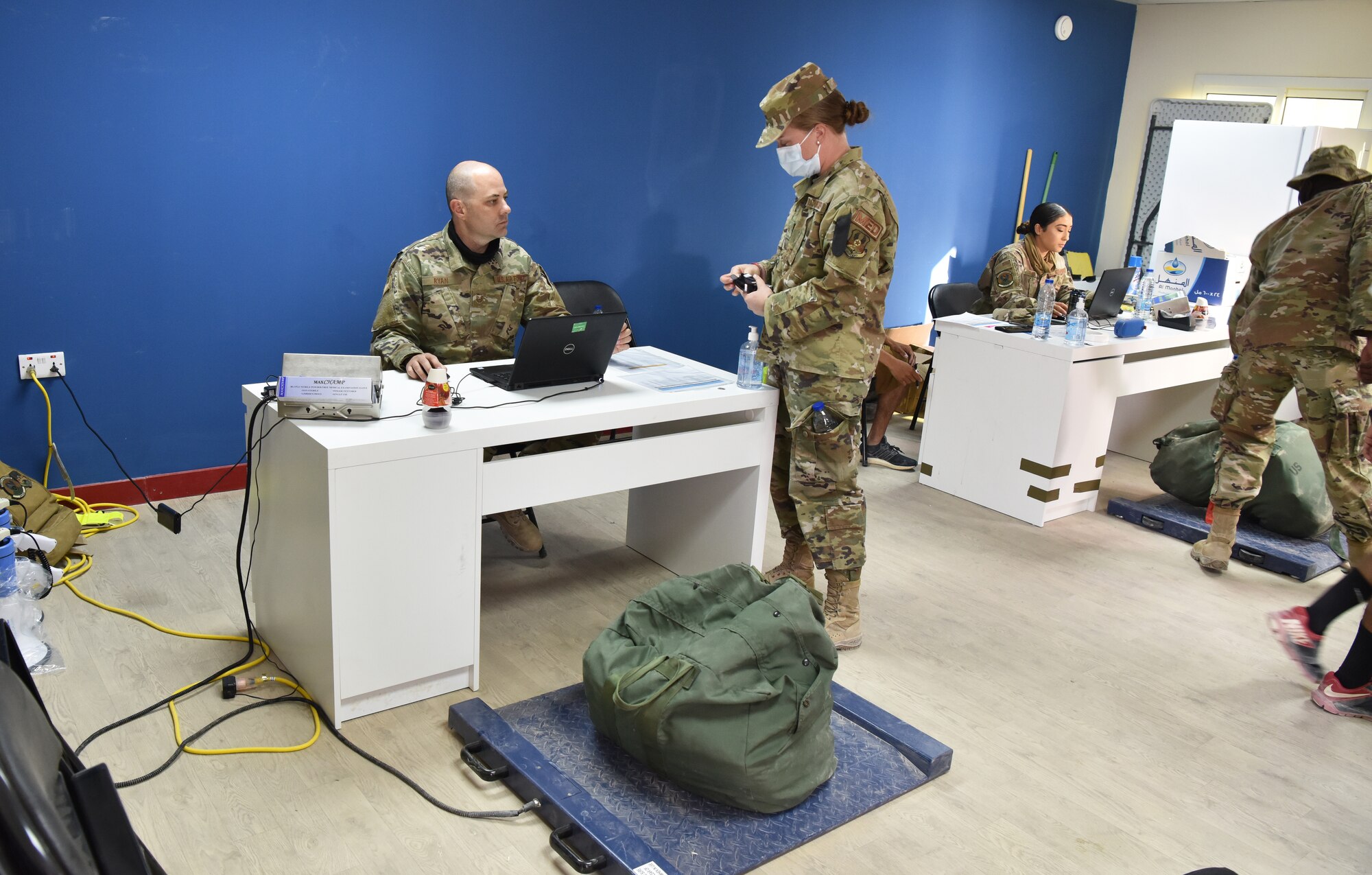 The 378th Expeditionary Logistics Readiness Squadron moves bags at Prince Sultan Air  Base, Kingdom of Saudi Arabia, June 28, 2020.