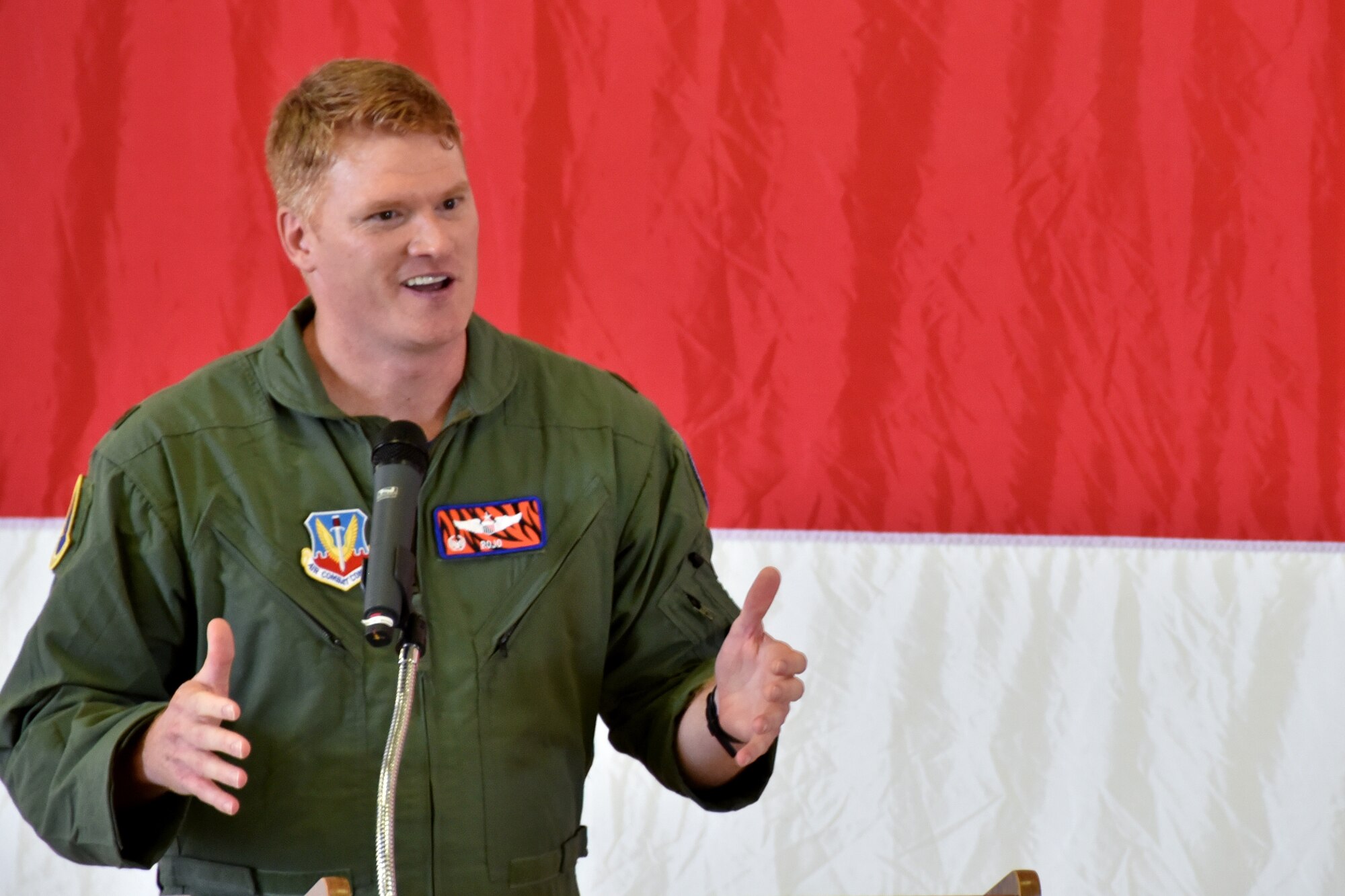 Maj. Ryan “Rojo” Busbey, 24th Fighter Squadron commander, addresses his Airmen during the 24th FS assumption of command ceremony, June 26, 2020, at Naval Air Station Joint Reserve Base Fort Worth, Texas. Busbey is responsible for ensuring the safety, effectiveness, and combat readiness of all his Airmen. (U.S. Air Force photo by Staff Sgt. Randall Moose)