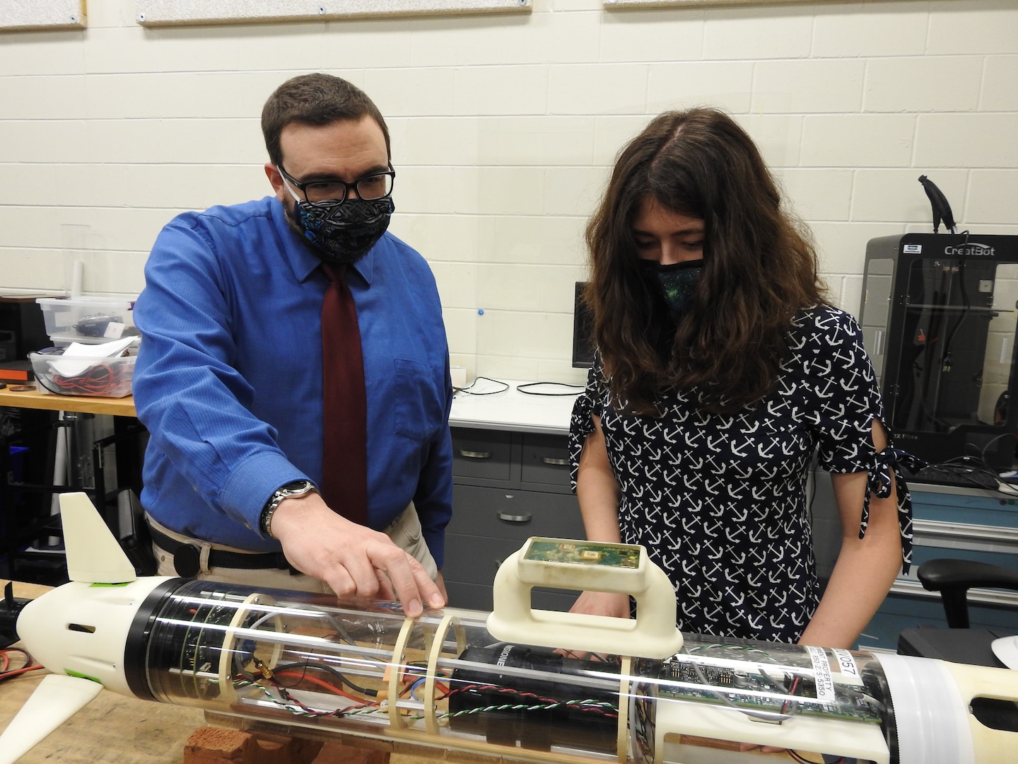 The Naval Surface Warfare Center Panama City Division (NSWC PCD) has made their selections for this year’s Science Mathematics and Research for Transformation (SMART) scholarship recipients.  In this photo, Dr. J. D. Walsh, applied sensing and processing branch head at NSWC PCD, describes components of an unmanned system to SMART scholar recipient Jacqueline Jermyn.