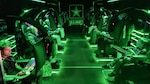 Visitors play video games inside a semitrailer belonging to the U.S. Army Recruiting Command's esports team during the Association of the U.S. Army's Annual Meeting and Exposition in Washington, D.C., Oct. 14, 2019. The command plans to create a cyber esports team and roll out autonomous recruiting operations, which will increase the mobility of recruiters with a larger social media presence.