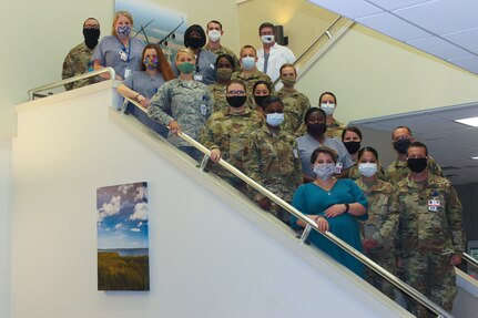 Dental clinic personnel from the 628th Operational Medical Readiness Squadron pose for a photo at Joint Base Charleston, S.C. The dental clinic is open for dental emergencies and deployment exams and has recently started taking annual exams. Dental clinic personnel are protecting their patients and themselves by regularly cleaning surfaces, wearing masks and gloves, reducing the number of patients they see, practicing physical distancing whenever possible and having patients use pretreatment mouth rinse.