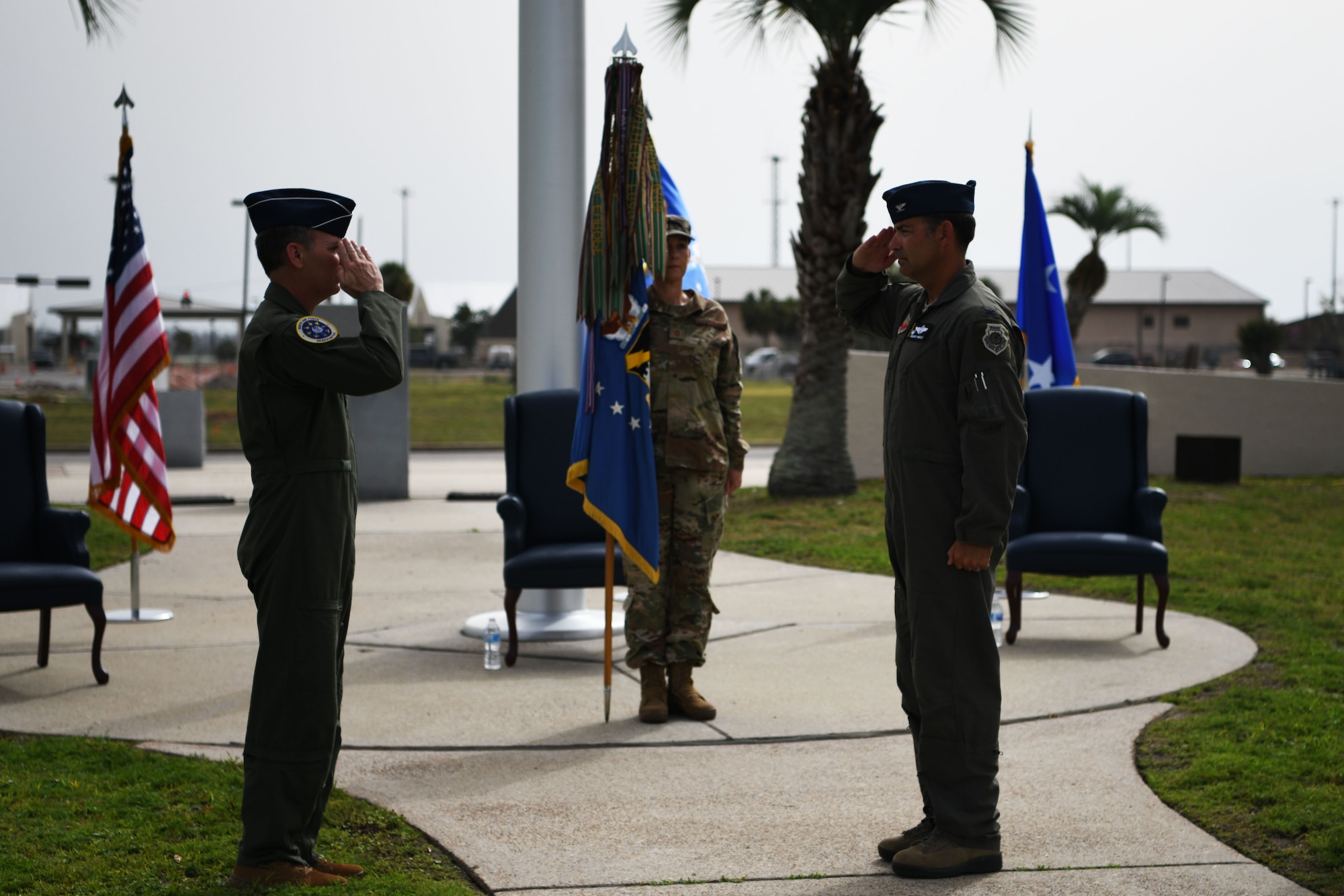 U.S. Air Force Col. Greg Moseley assumes command of the 325th Fighter Wing from U.S. Air Force Maj. Gen. Chad Franks, Ninth Air Force commander, during a change of command ceremony at Tyndall Air Force Base, Florida, June 26, 2020. As the 325th FW commander, Moseley will oversee F-22 Raptor pilot training as well as the continued rebuild of the base following the damage done by Hurricane Michael in 2018. (U.S. Air Force photo by Tech. Sgt. Clayton Lenhardt)