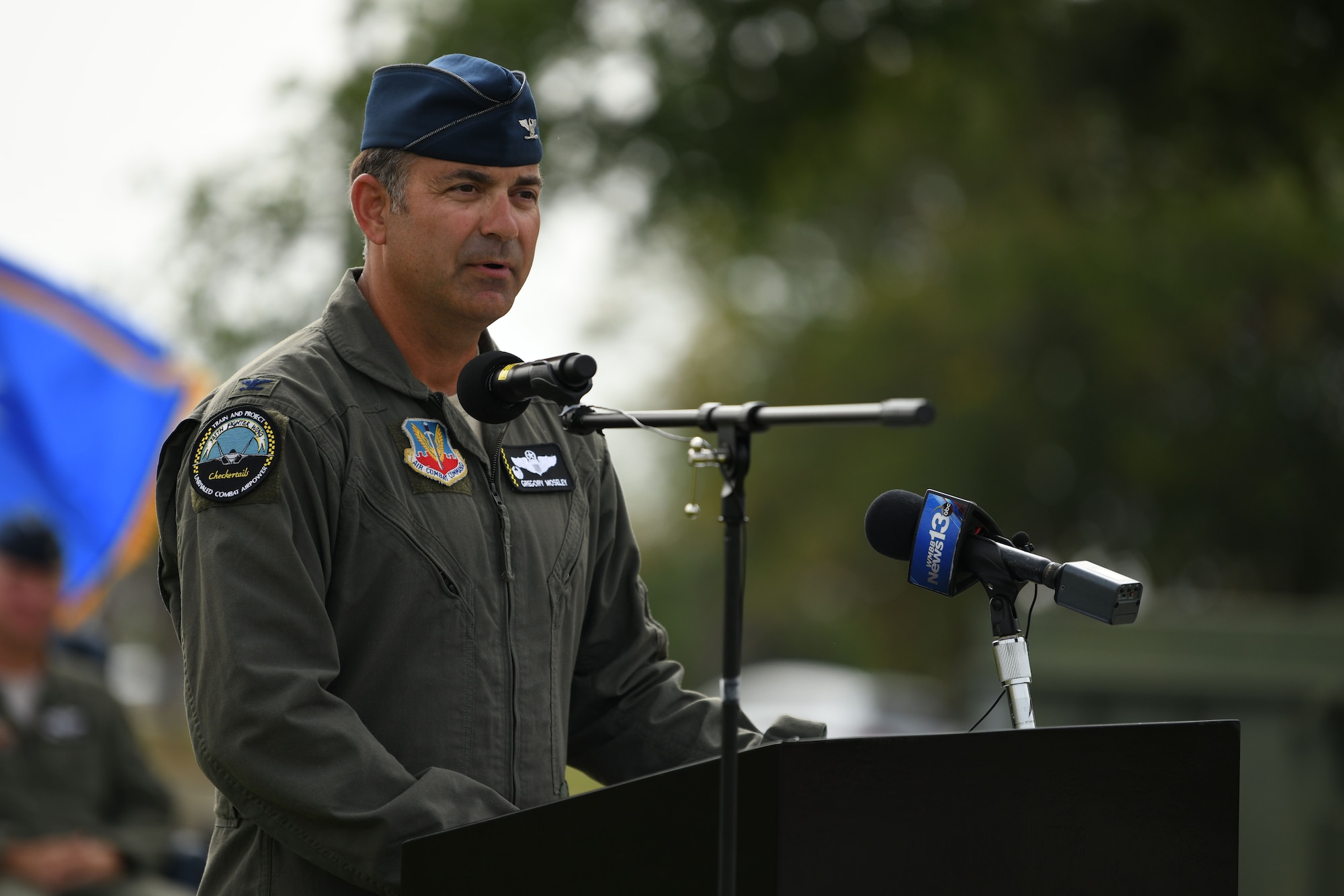 U.S. Air Force Col. Greg Moseley, 325th Fighter Wing commander, speaks during a change of command ceremony at Tyndall Air Force Base, Florida, June 26, 2020. As the 325th FW commander, Moseley will oversee F-22 Raptor pilot training as well as the continued rebuild of the base following the damage done by Hurricane Michael in 2018. (U.S. Air Force photo by Tech. Sgt. Clayton Lenhardt)